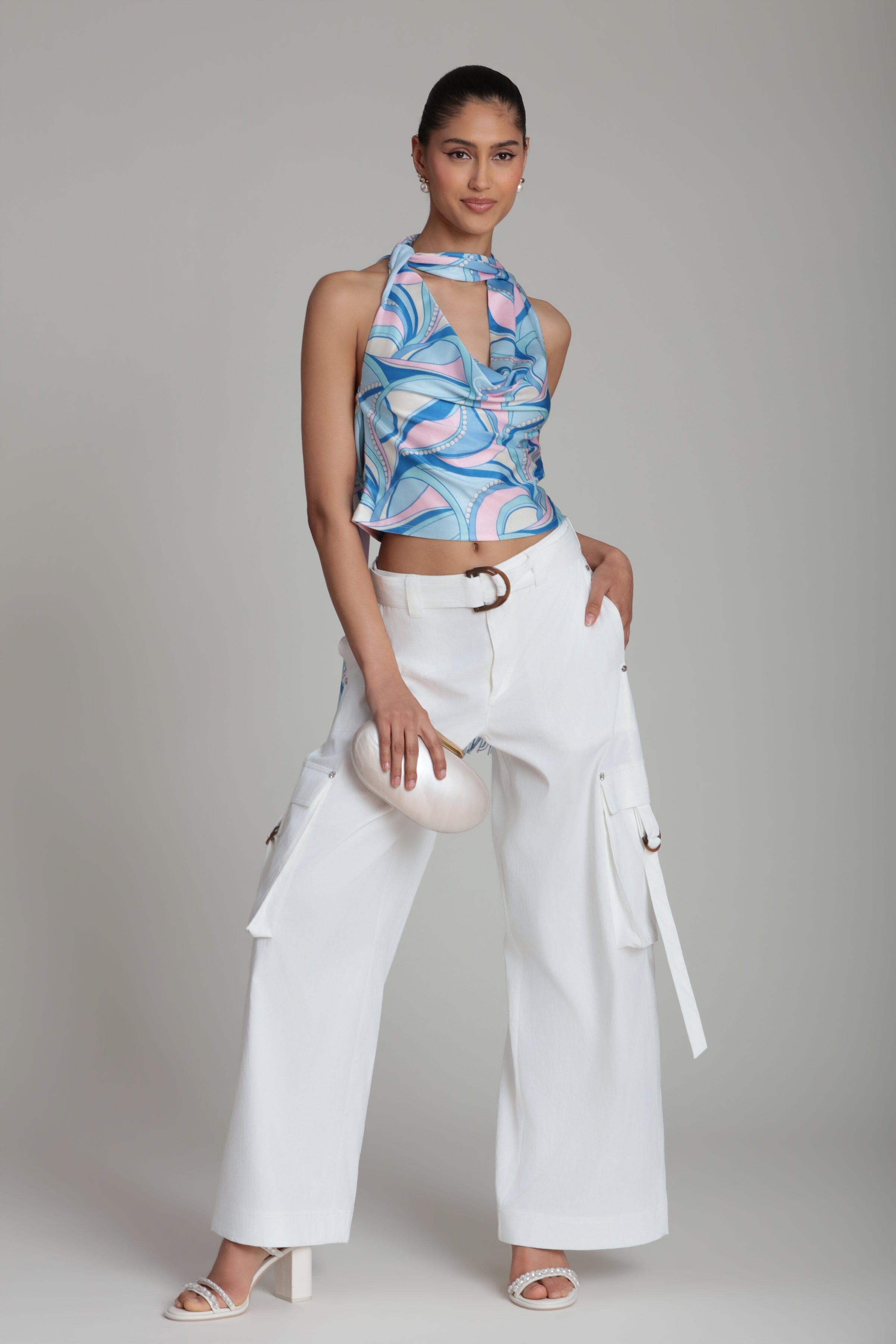 White cargo pants with halter cowl neck top - Shop women's white cargo pants and satin tops by Avec Les Filles