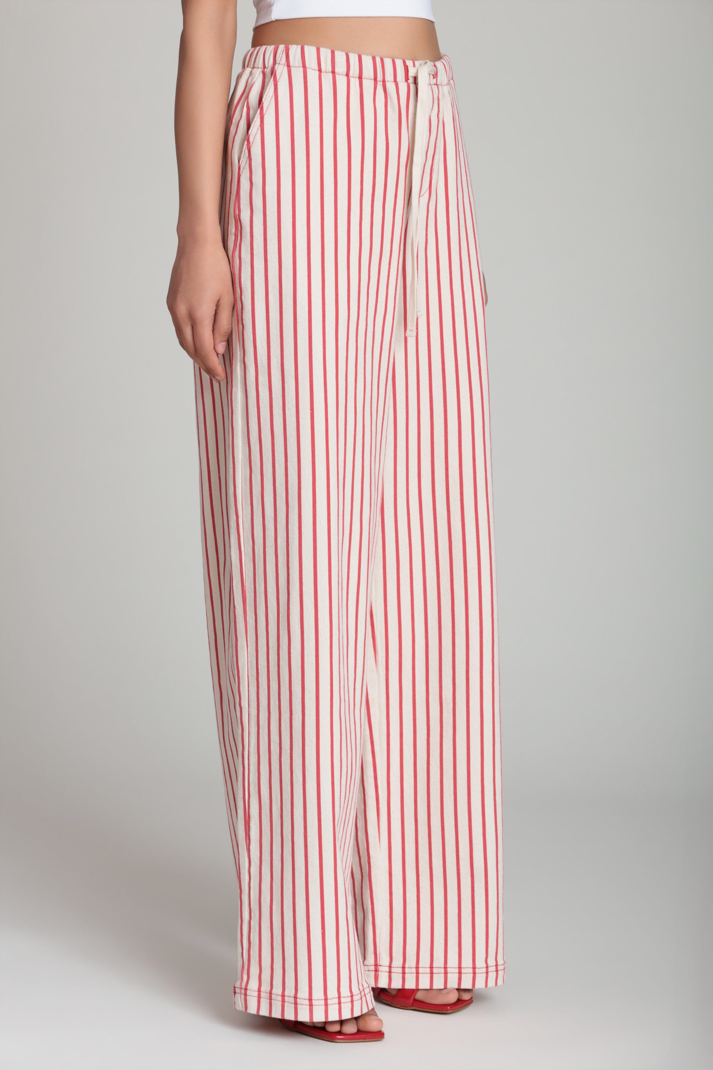 Red stripe pants with elastic waistband with adjustable drawstring tie - Shop cotton striped pants by Avec Les Filles