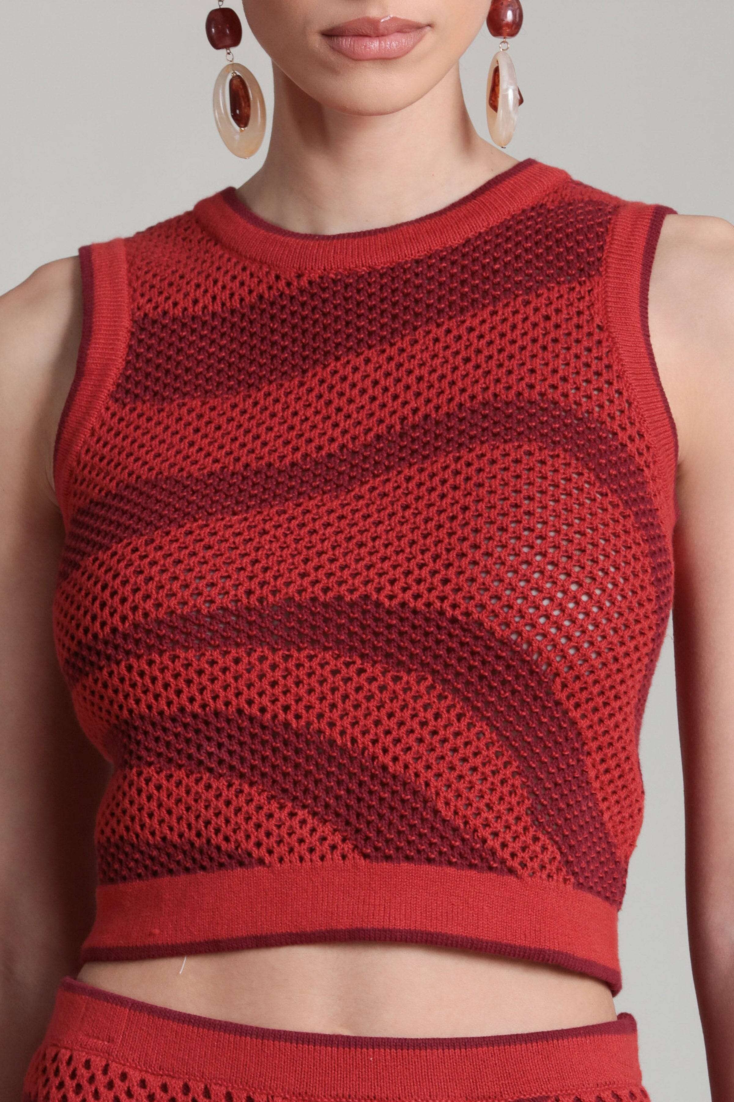 Striped red mesh top with crew neckline. Shop designer womens mesh tops by Avec Les Filles.