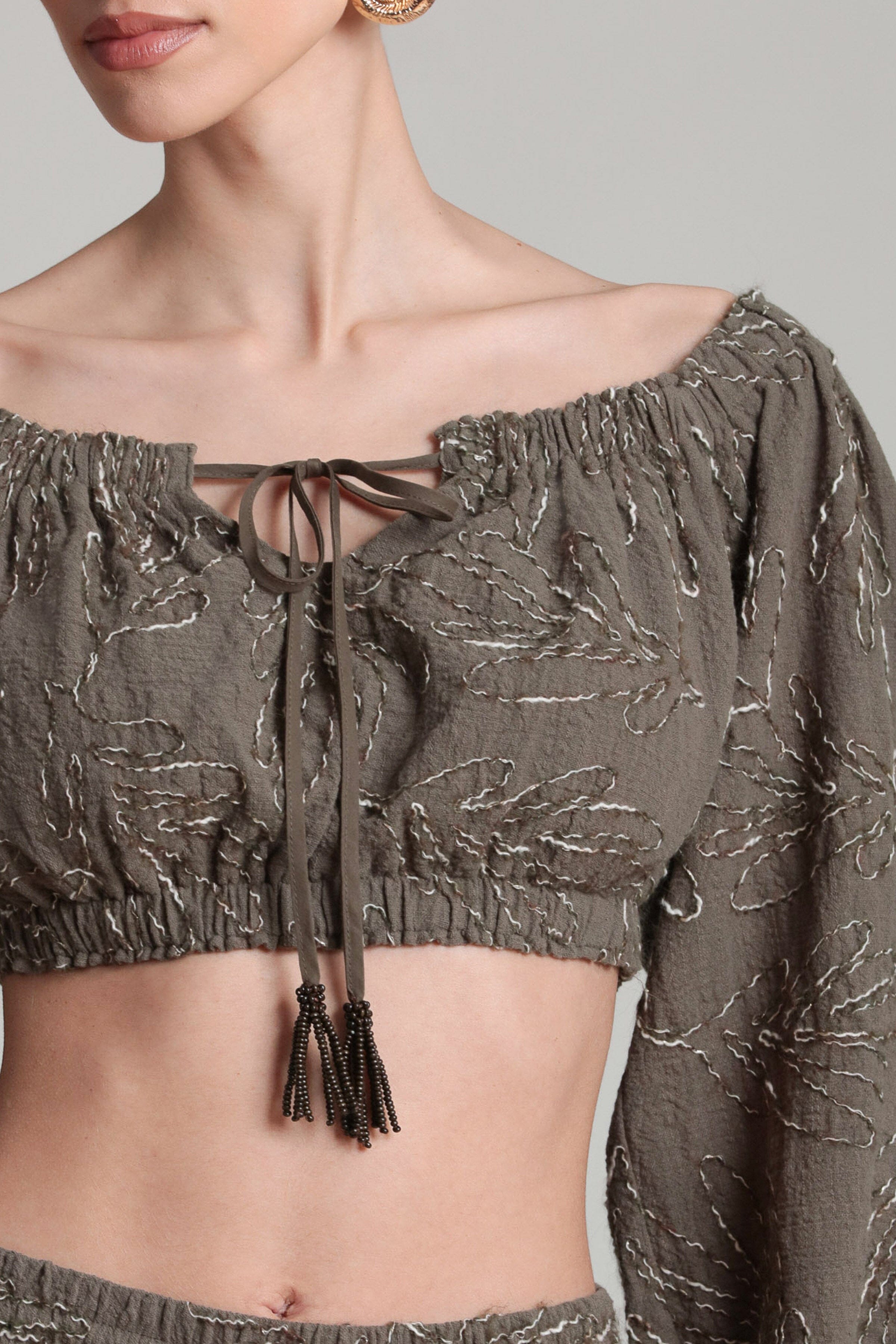 Embroidered olive puff sleeve cropped tops. Shop designer women's cute crop tops by Avec Les Filles.