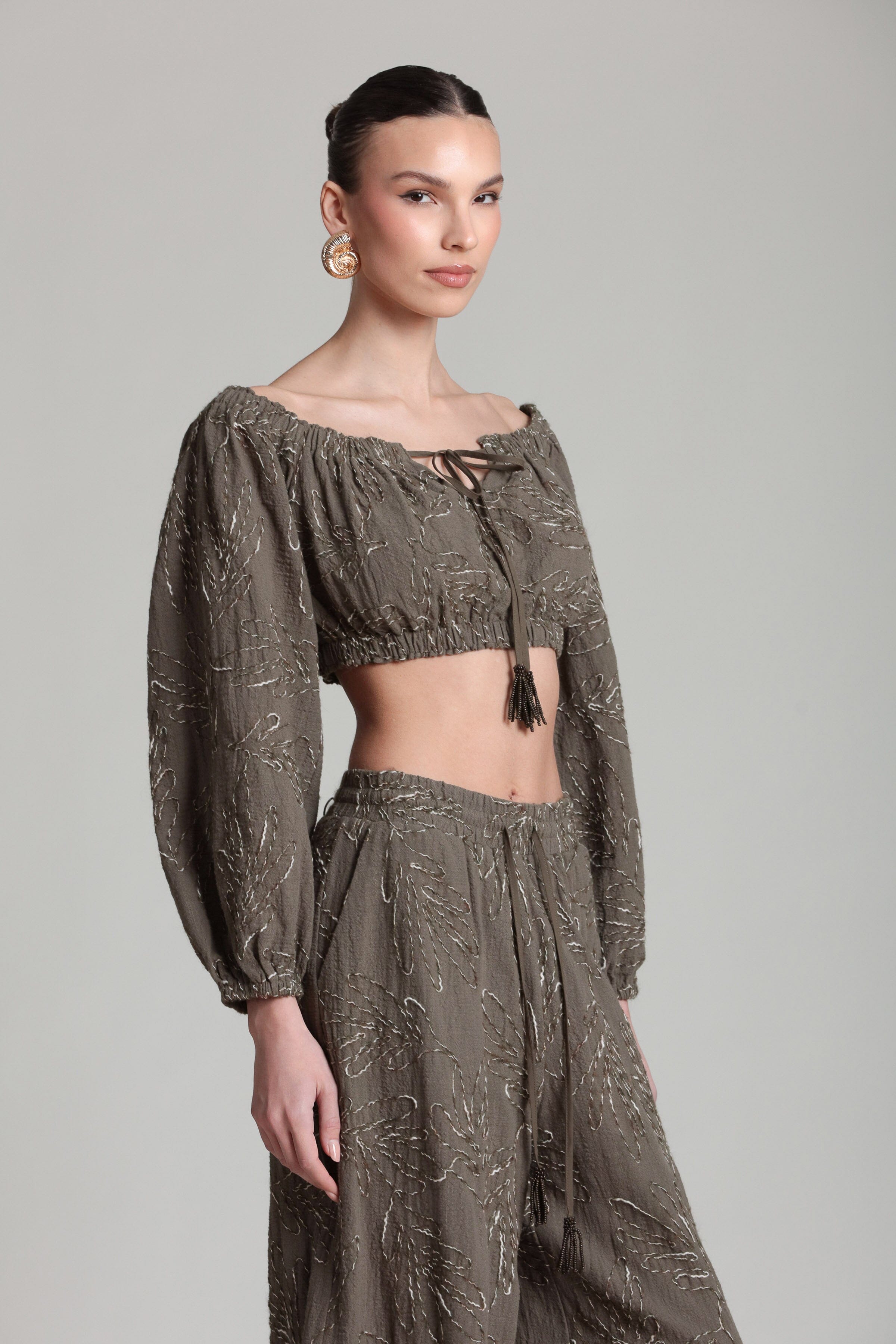 Embroidered olive puff sleeve crop top with puff sleeve. Shop designer women's cute crop tops by Avec Les Filles.