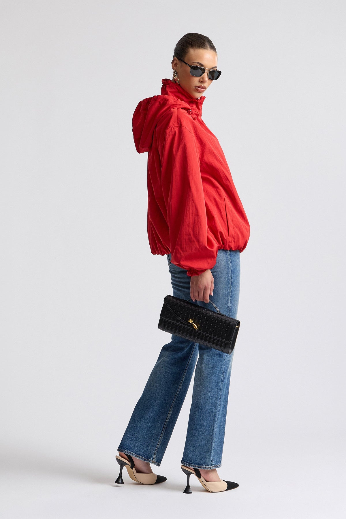 Nylon windbreaker red jacket with balloon sleeves. Shop designer women's cute red jackets by Avec Les Filles.