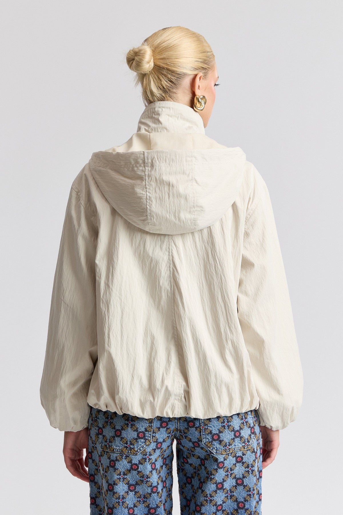 White hooded winter jacket womens with balloon sleeves. Shop designer white jackets by Avec Les Filles.