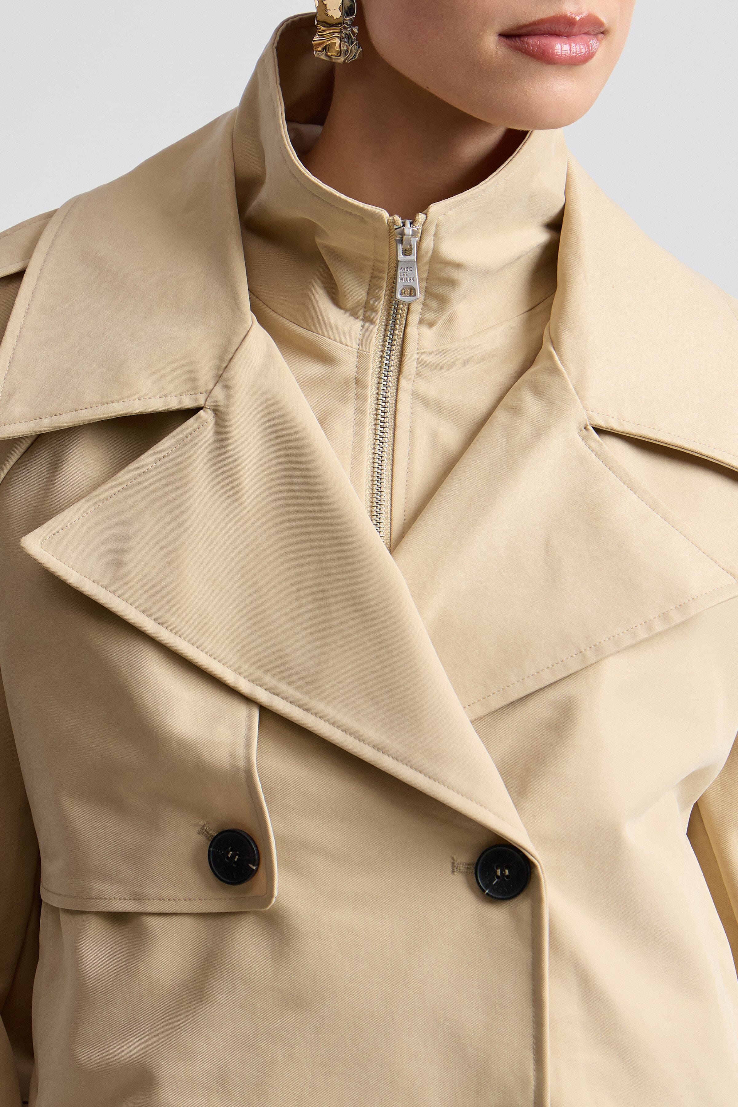khaki colored trench coat with button front and long raglan sleeves - Shop designer women's trench coats by Avec Les Filles