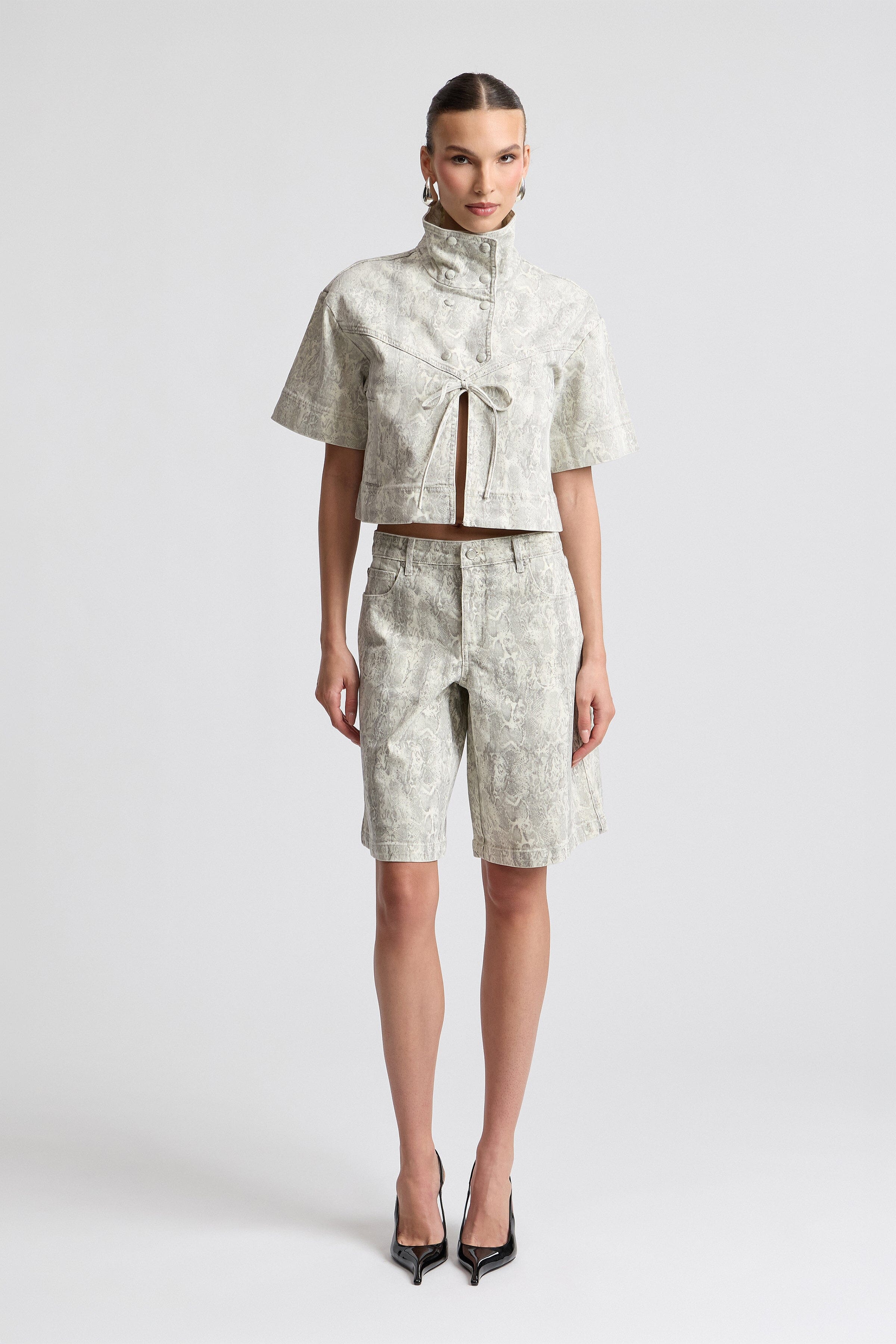 Animal print denim knee-length shorts. Shop designer women's shorts by Avec Les Filles.