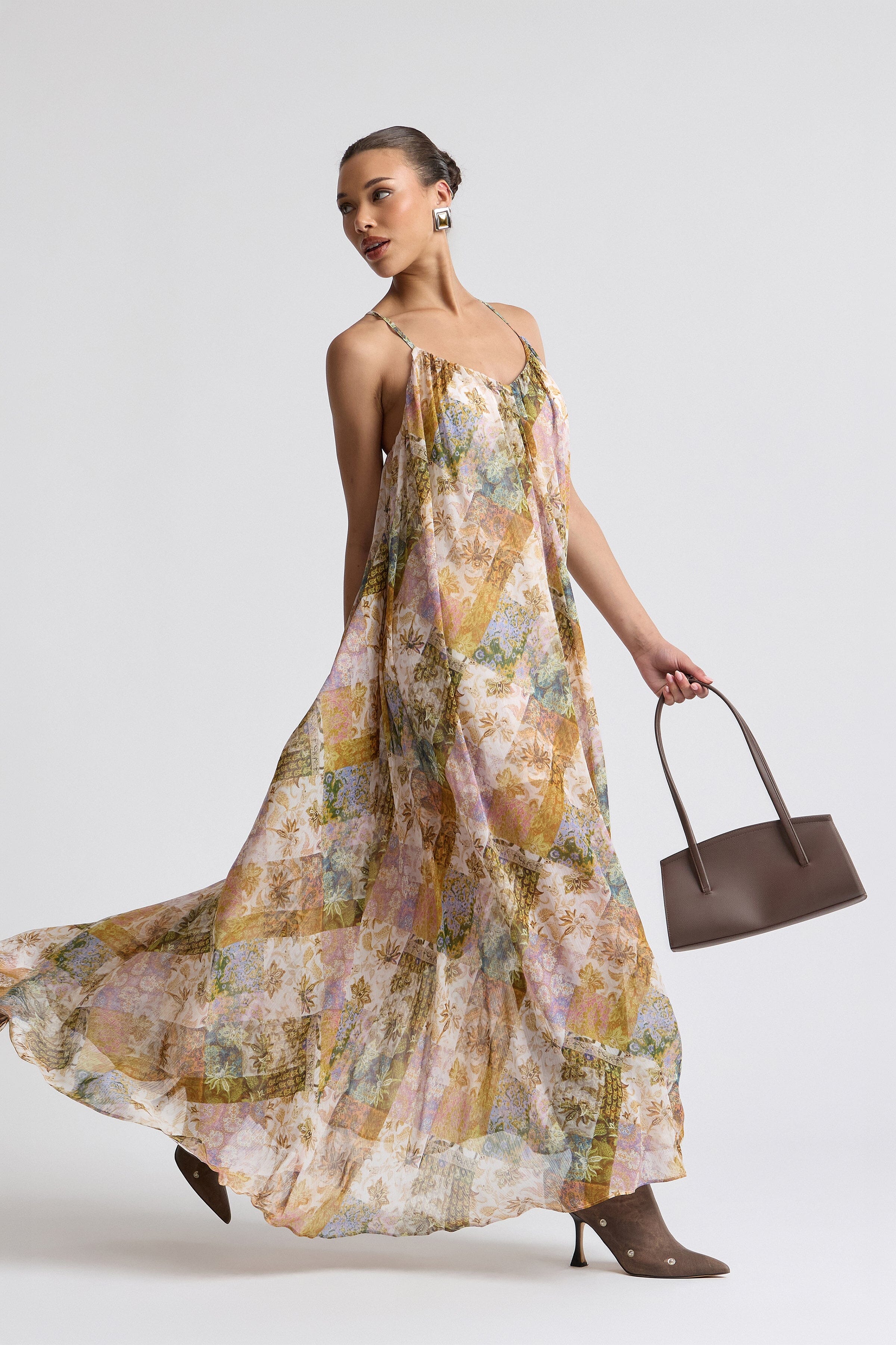Outpost paisley pattern dress with adjustable spaghetti straps. Shop designer women's maxi dresses by Avec Les Filles.