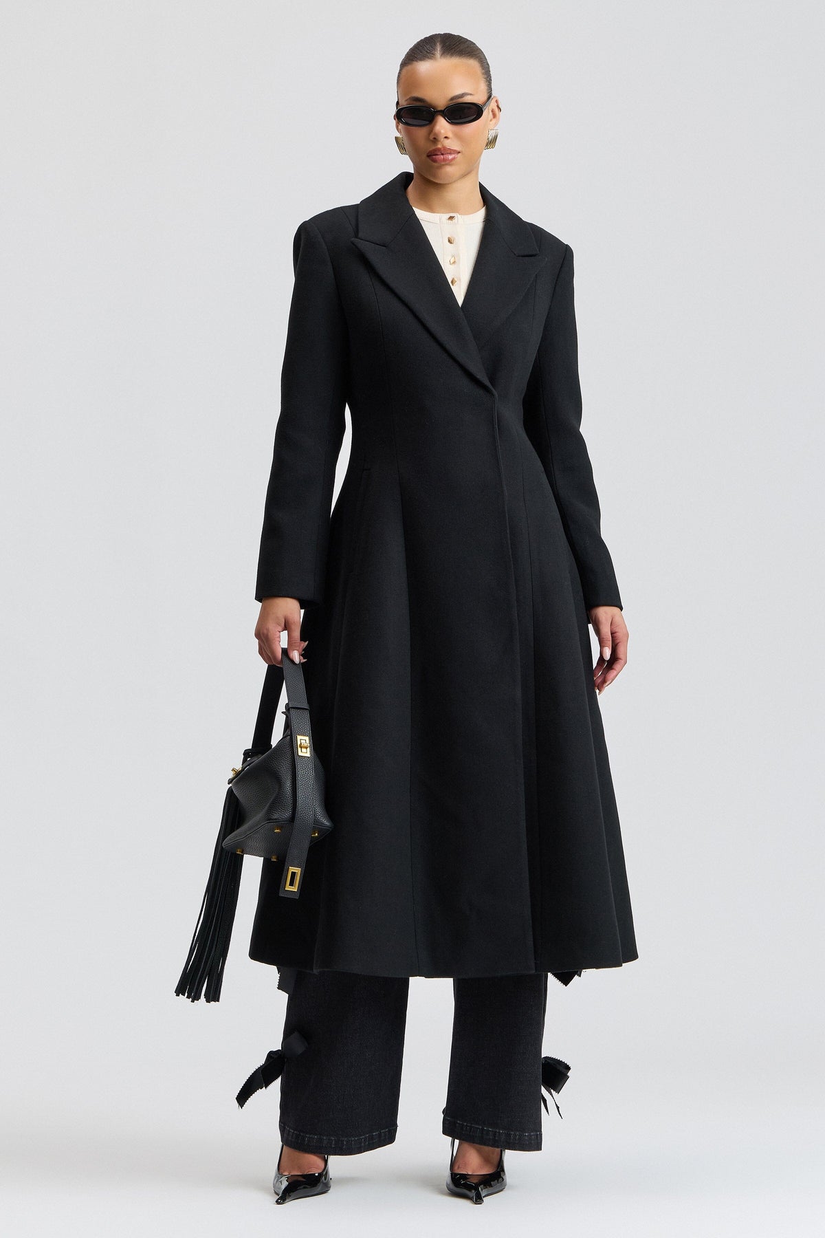 Women long black overcoat in wool blend with button- front - Shop designer black coats by Avec Les Filles.