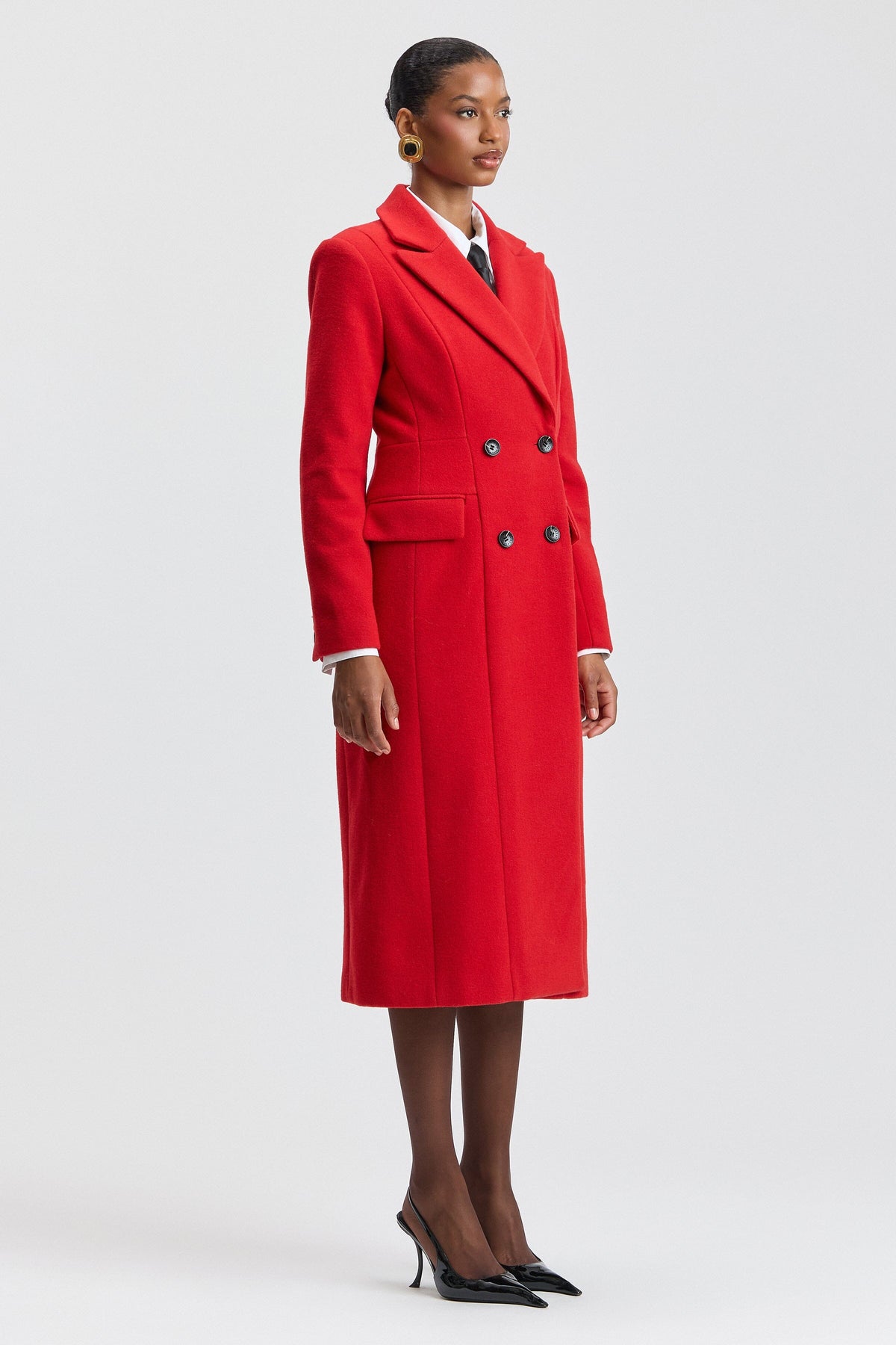 Double-breasted red long womens coat with a notched lapel collar. Shop cute long coats by Avec Les Filles.