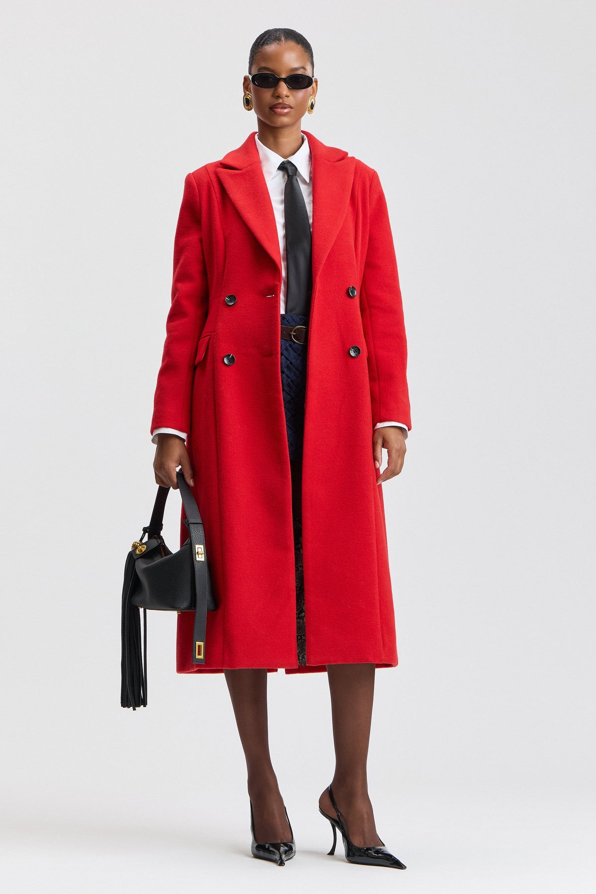 Red double breasted wool coat with a notched lapel collar. Shop women's cute long coats by Avec Les Filles.