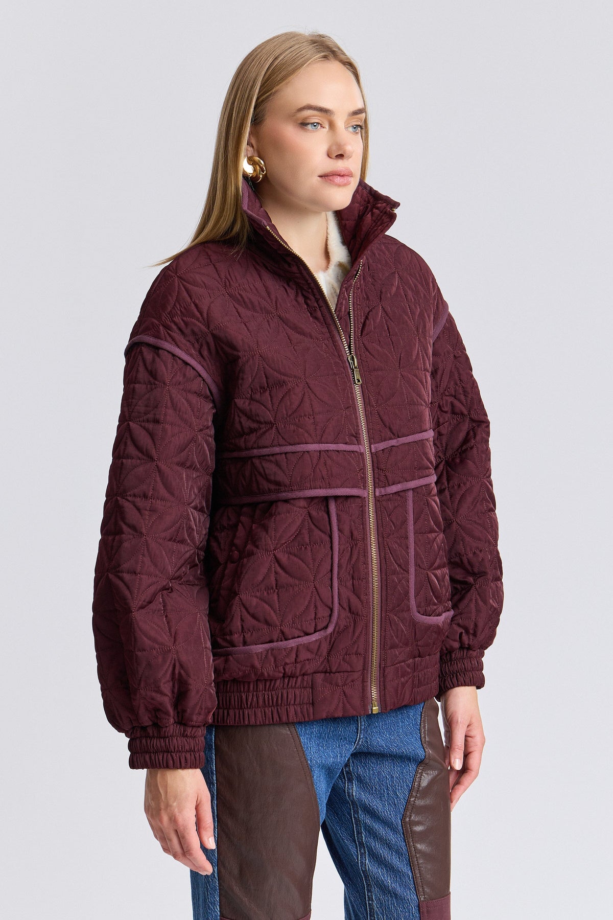 Quilted bomber jacket with a high funnel neck and long sleeves - Shop women's bomber jackets by Avec Les Filles.