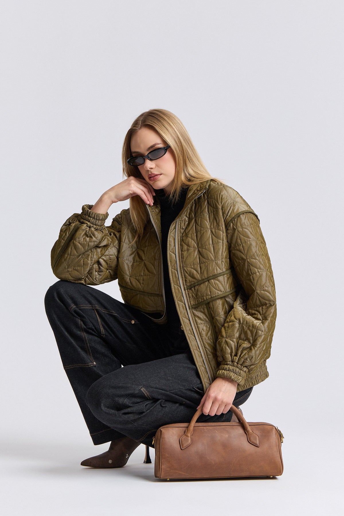 Oversized quilted green jacket womens with zip-front and long sleeves - Shop designer jackets by Avec Les Filles.