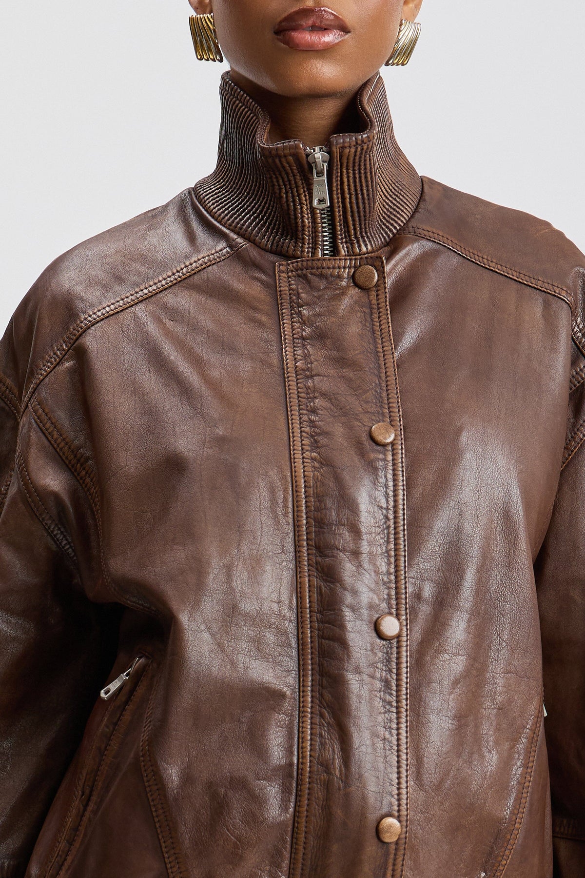 Brown leather bomber jacket oversized with front zip and snap buttons - Shop women's jackets by Avec Les Filles.