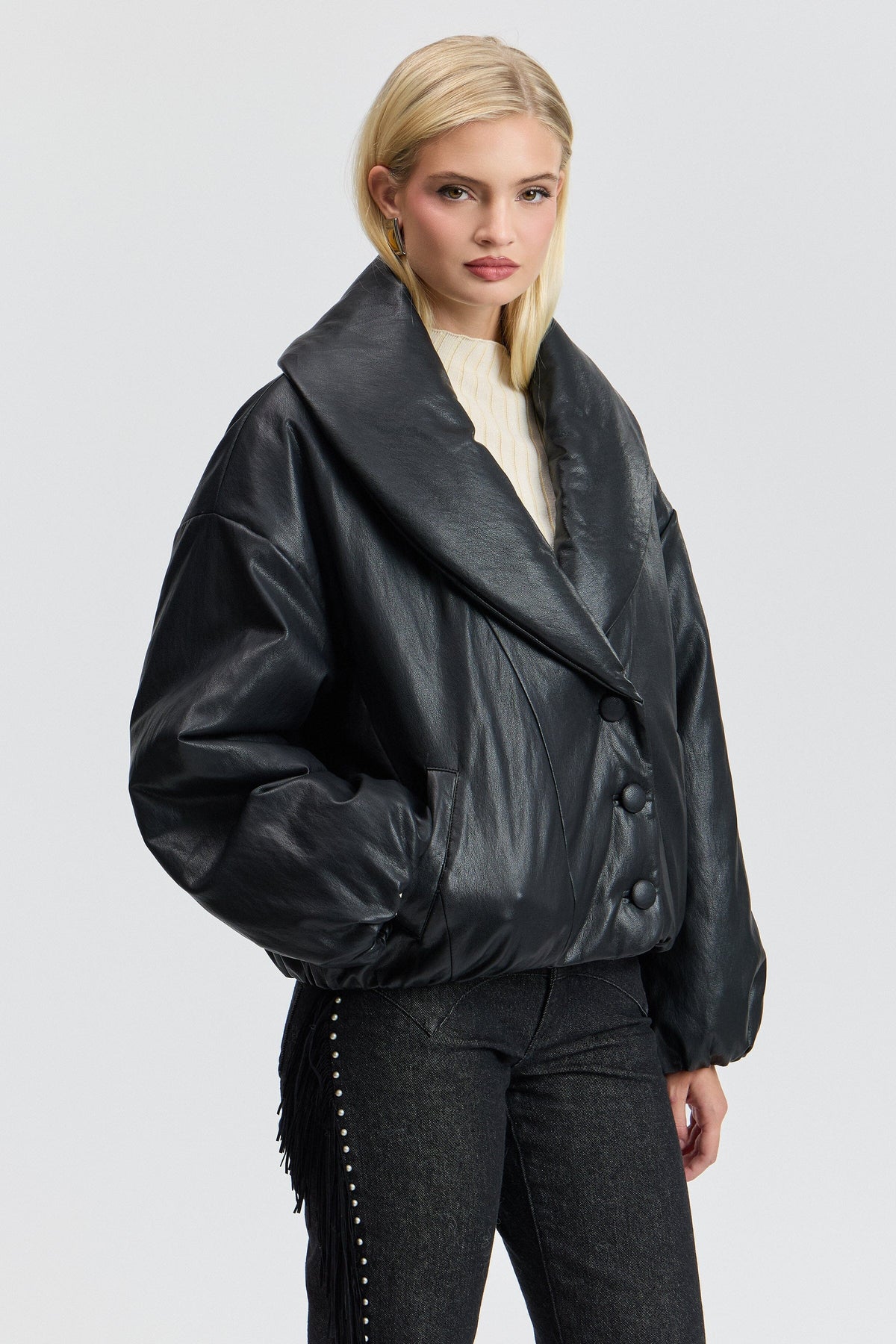 Leather puffer black jacket with shawl collar and button front. Shop women's black puffer jackets by Avec Les Filles.