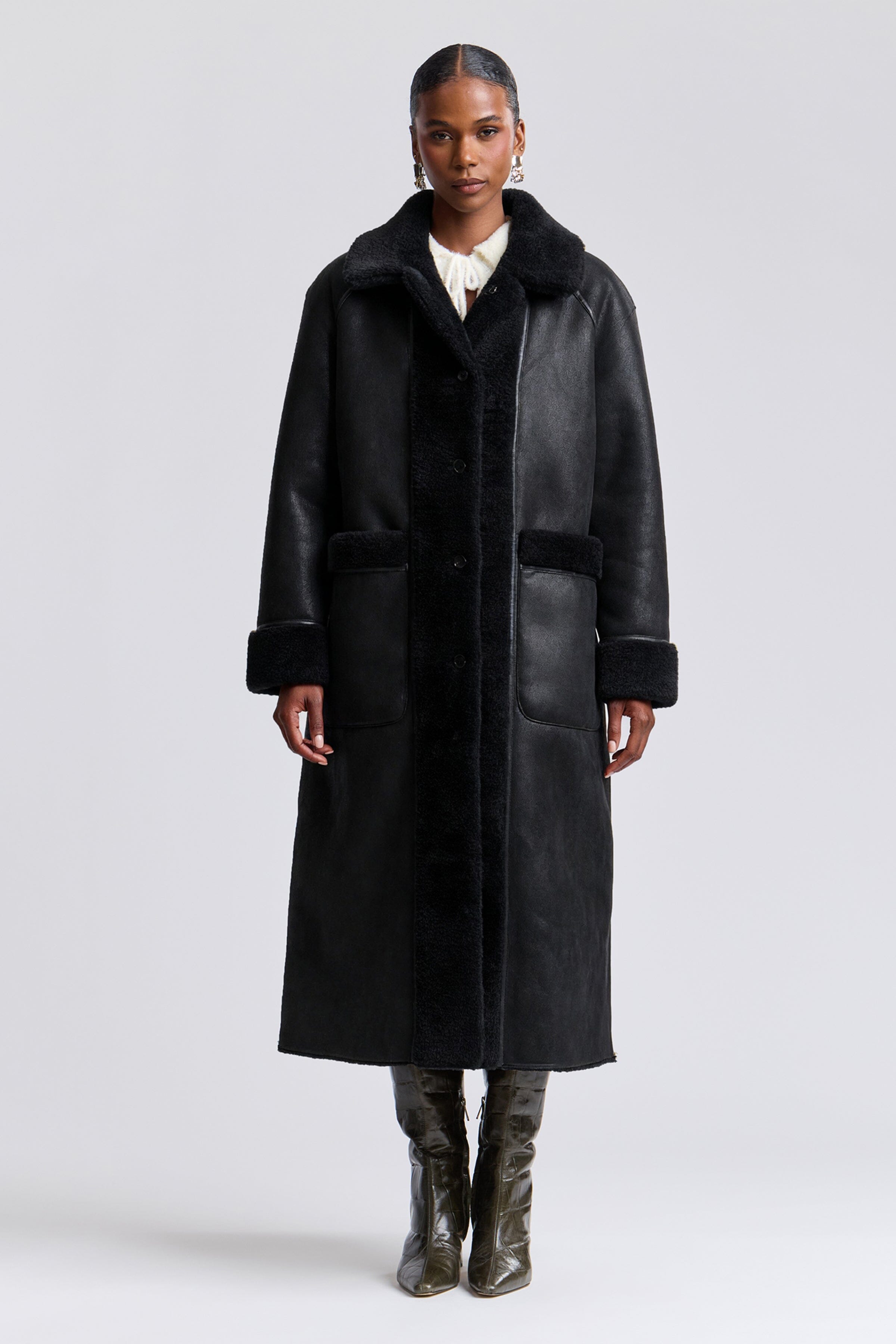 Reversible faux black shearling coat with front button and raglan sleeves - Shop women's long coats by Avec Les Filles.