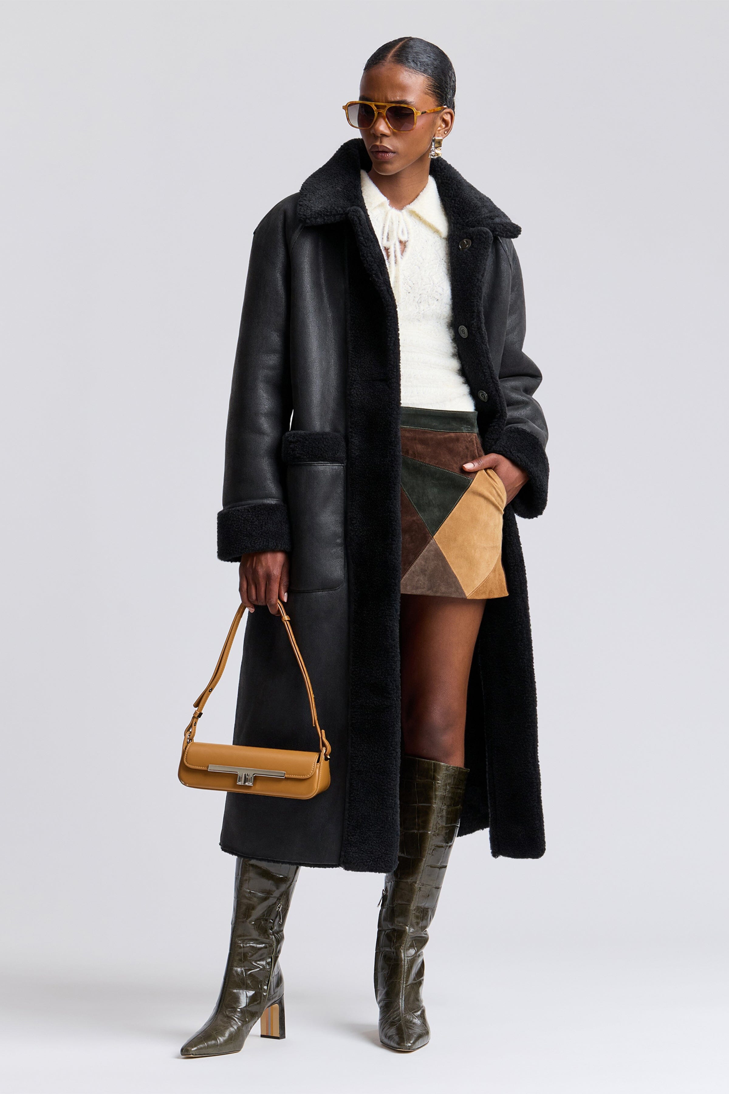 Reversible black shearling long coat with front button and raglan sleeves - Shop women's maxi coats by Avec Les Filles.