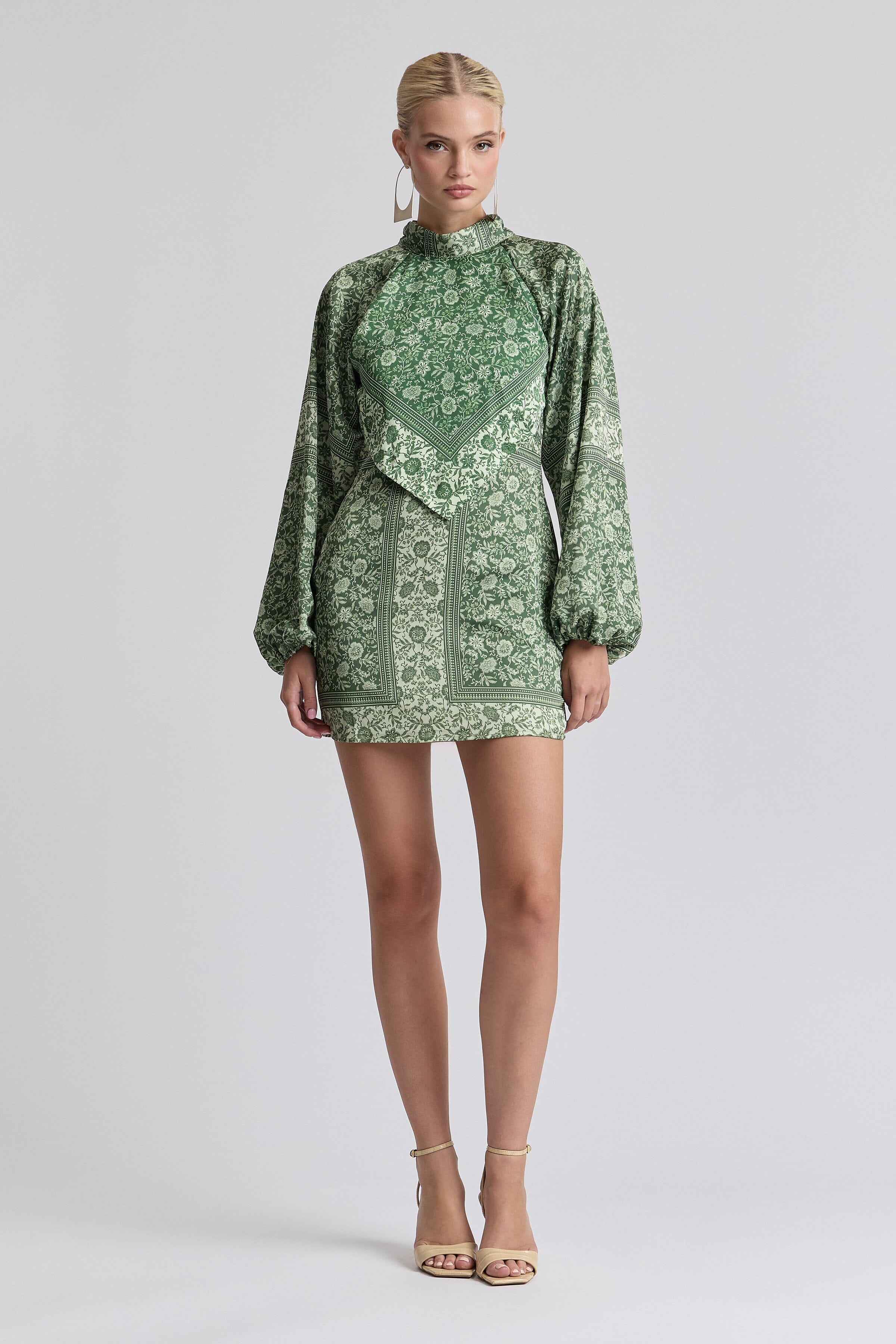 Printed satin scarf-neck green floral mini dress with long balloon sleeves. Shop women's mini dresses by Avec Les Filles.