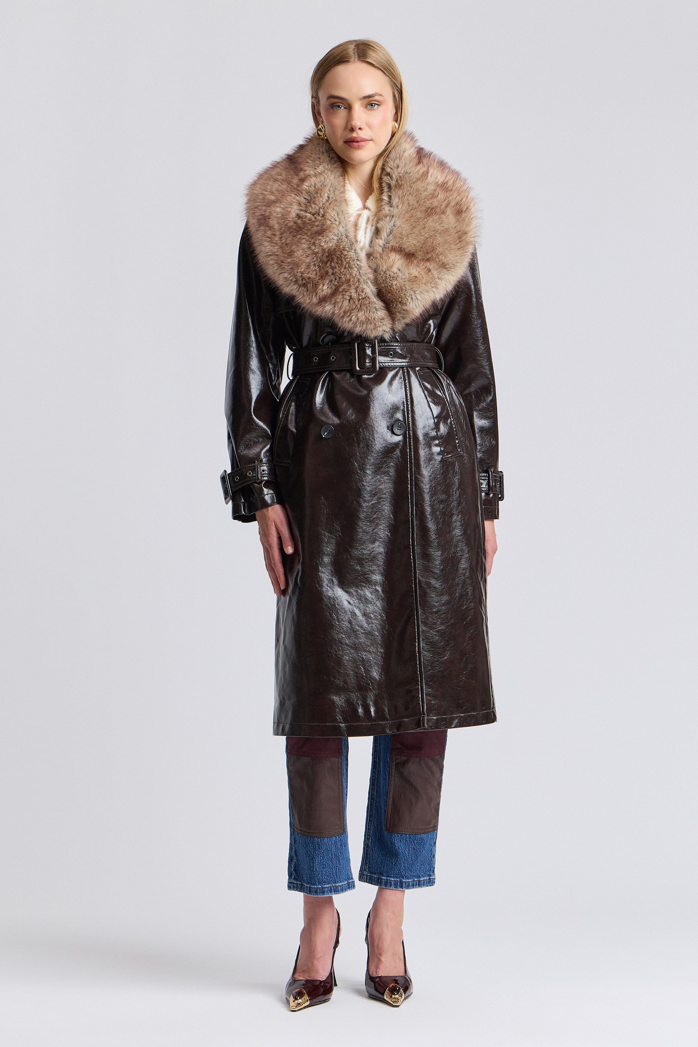 Double-breasted faux leather trench coat with a belt - Shop designer women's long coats by Avec Les Filles.