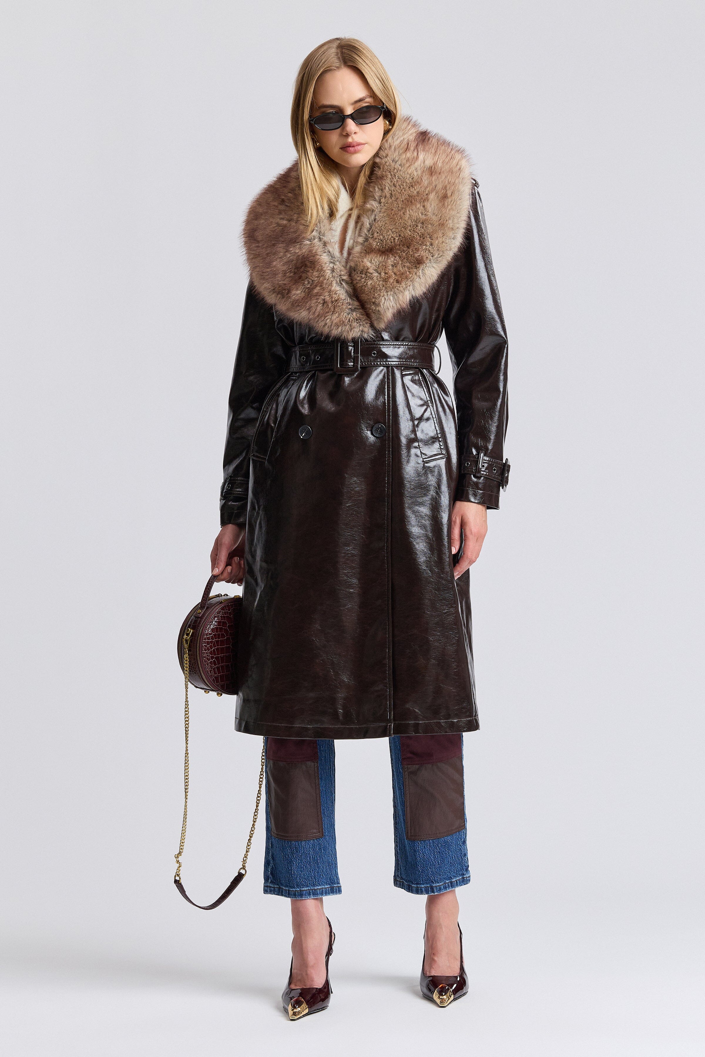 Double-breasted dark brown faux leather trench coat with a belt and detachable collar by Avec Les Filles.