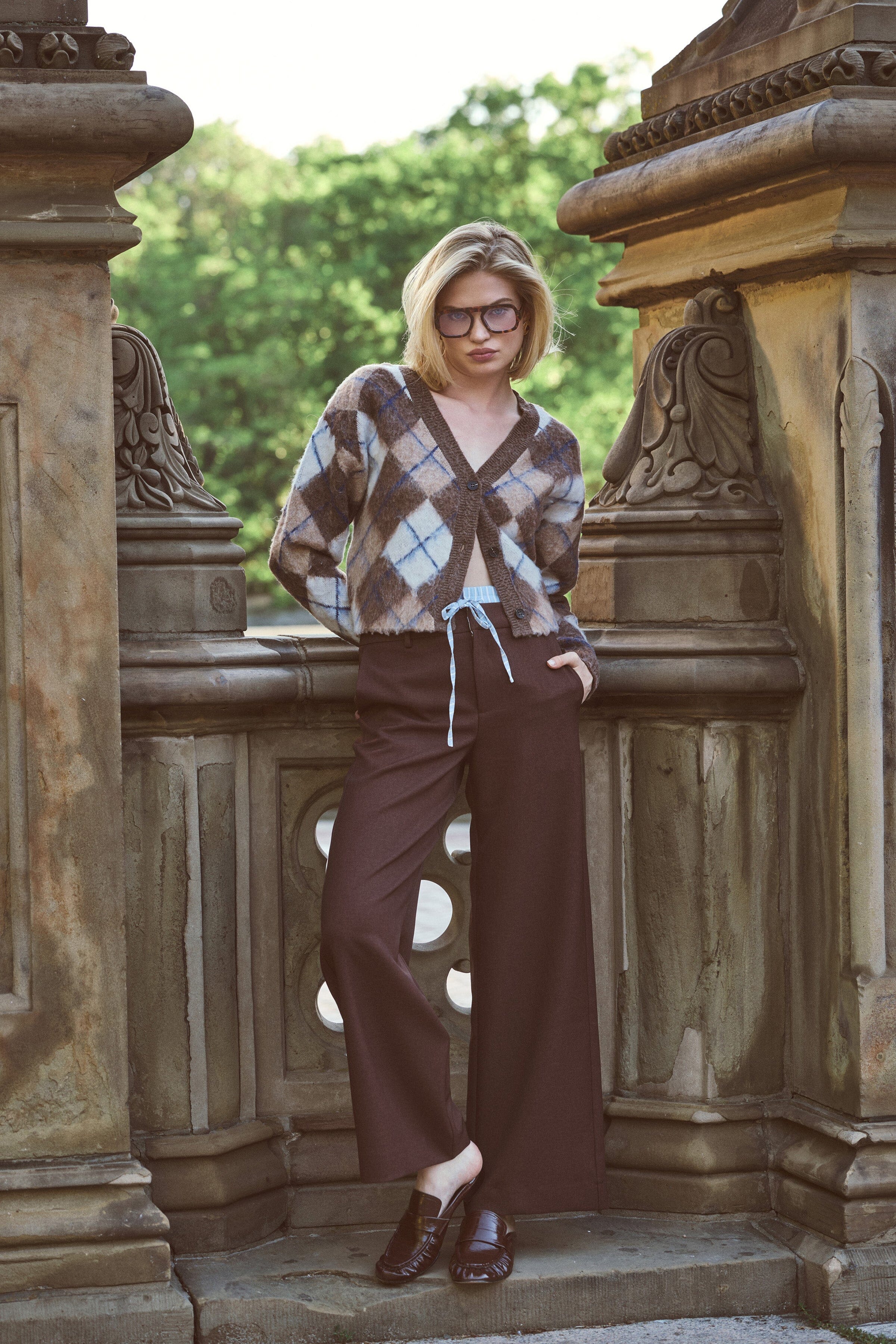 Jacquard brown cropped sweater with a button front and long balloon sleeves. Shop cute cardigan by Avec Les Filles.