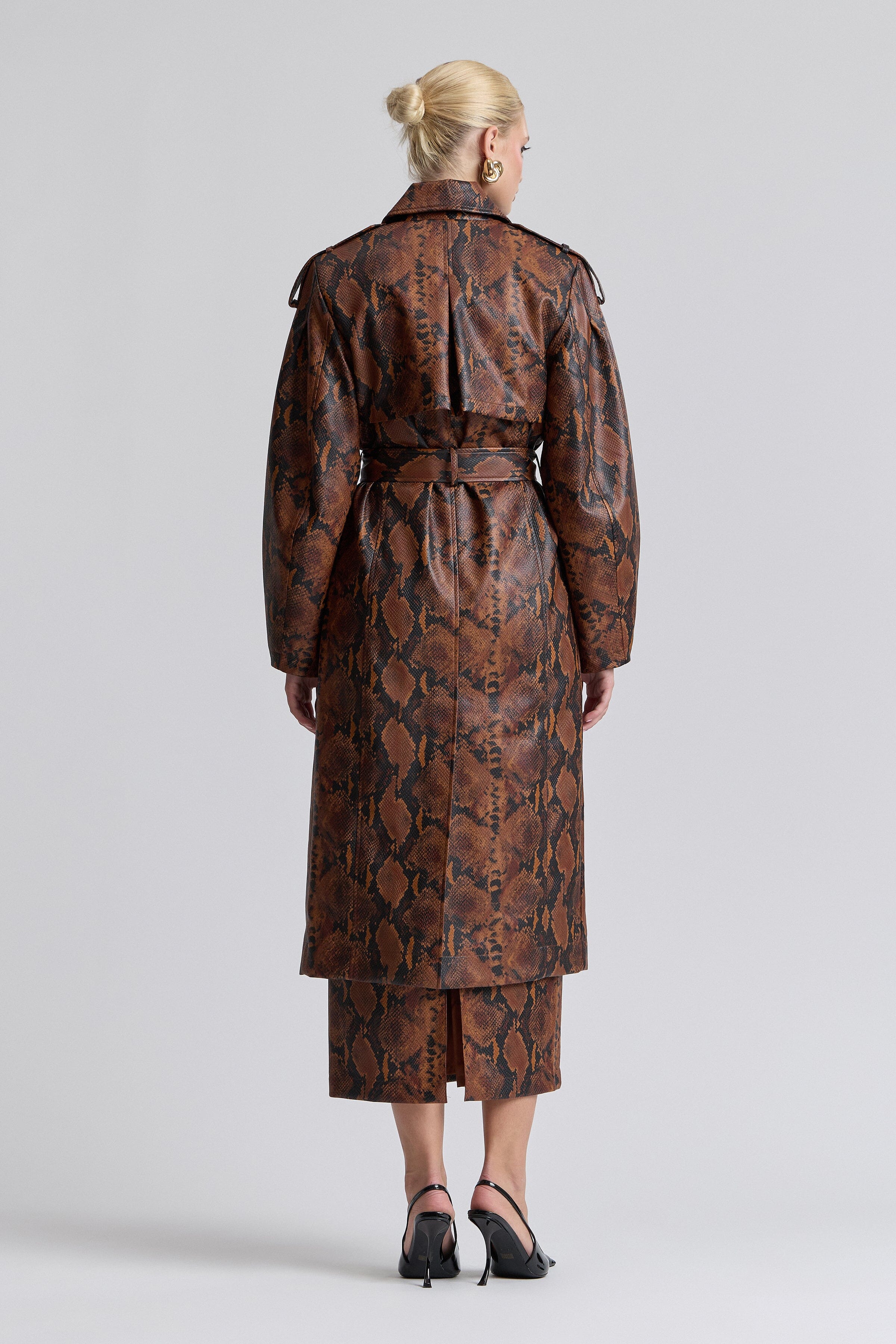 Brown snake print trench coat with long barrel sleeves and removable belt - Shop women's trench coats by Avec Les Filles.
