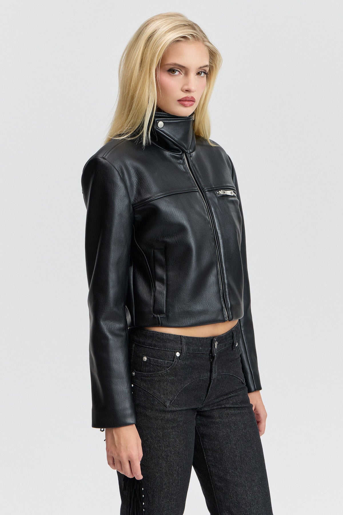 Black cropped faux leather jacket with a front zipper. Shop designer women's cute cropped jackets by Avec Les Filles.