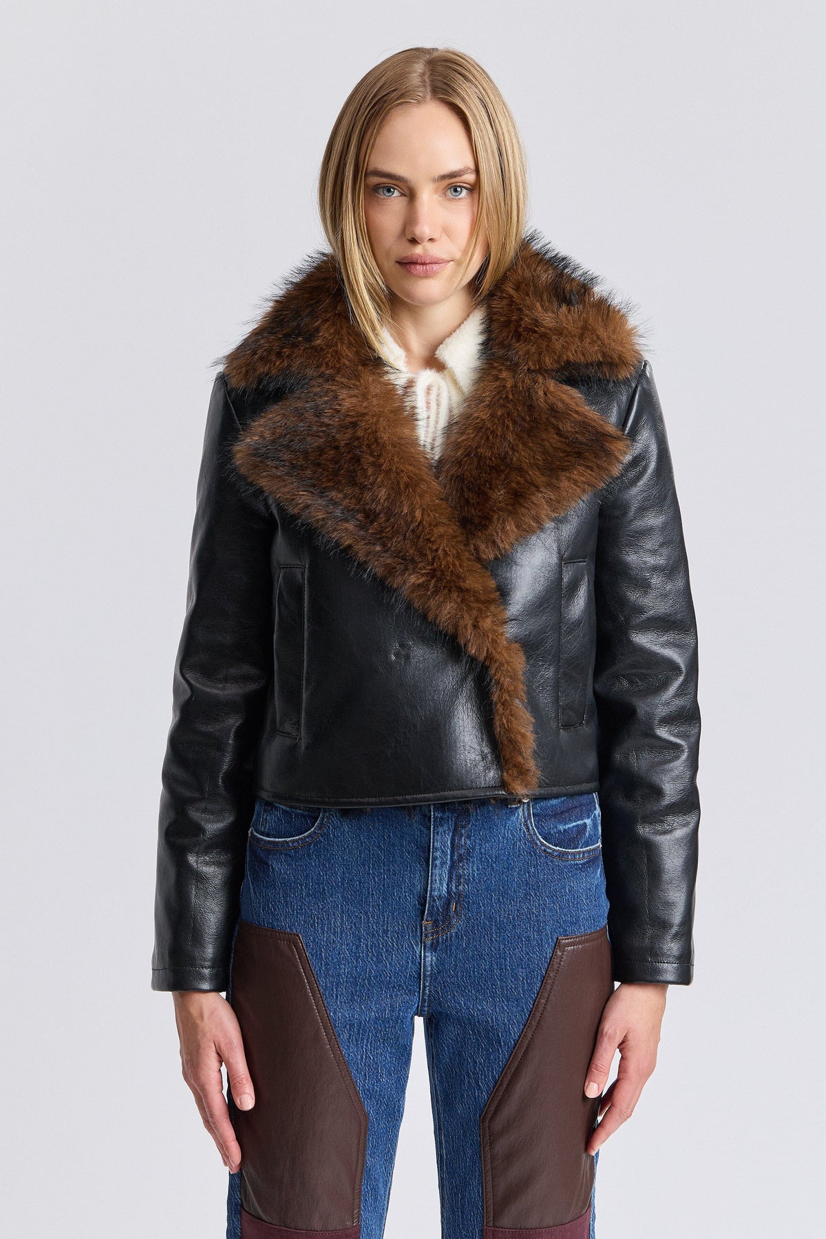 Black women's faux leather jacket with snap-front and long sleeves - Shop designer jackets by Avec Les Filles.