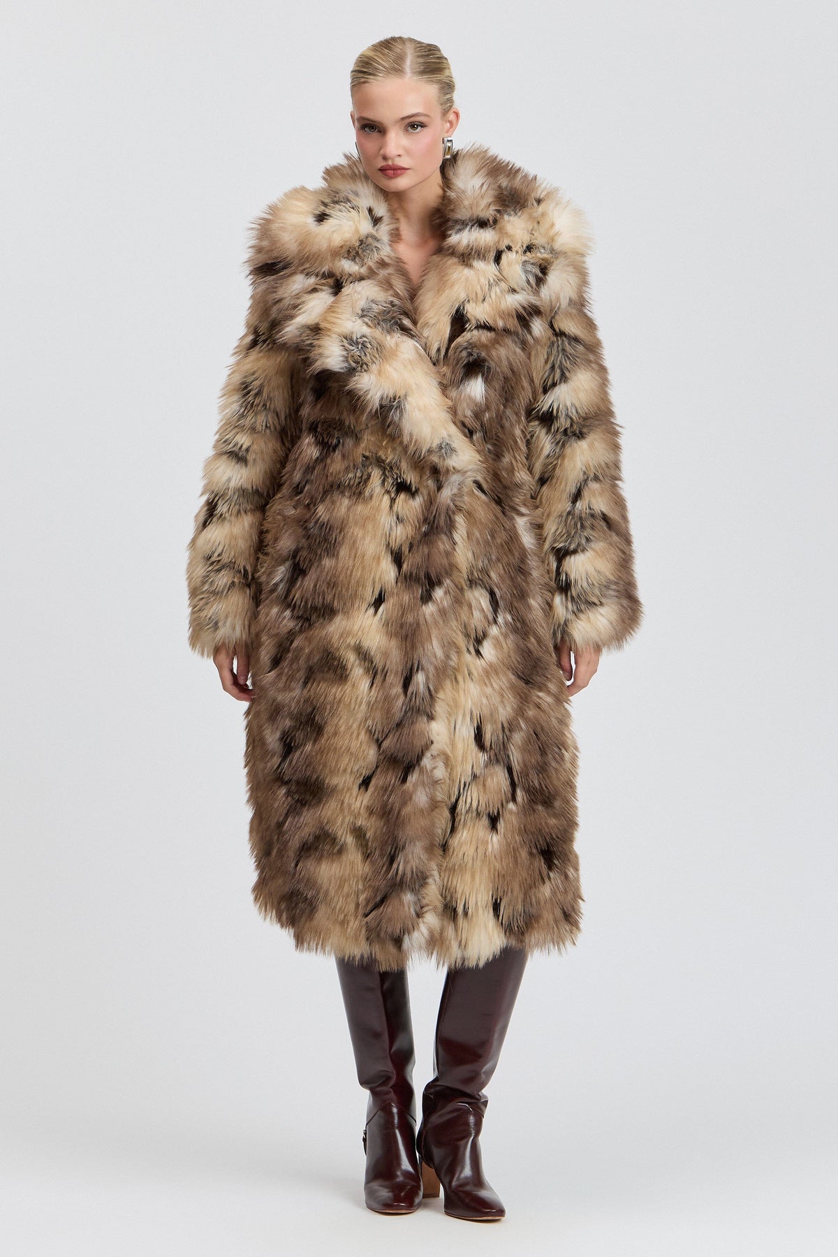 Brown womens faux fur coat with side slits and a wide collar. Shop designer tan fur coats by Avec Les Filles.