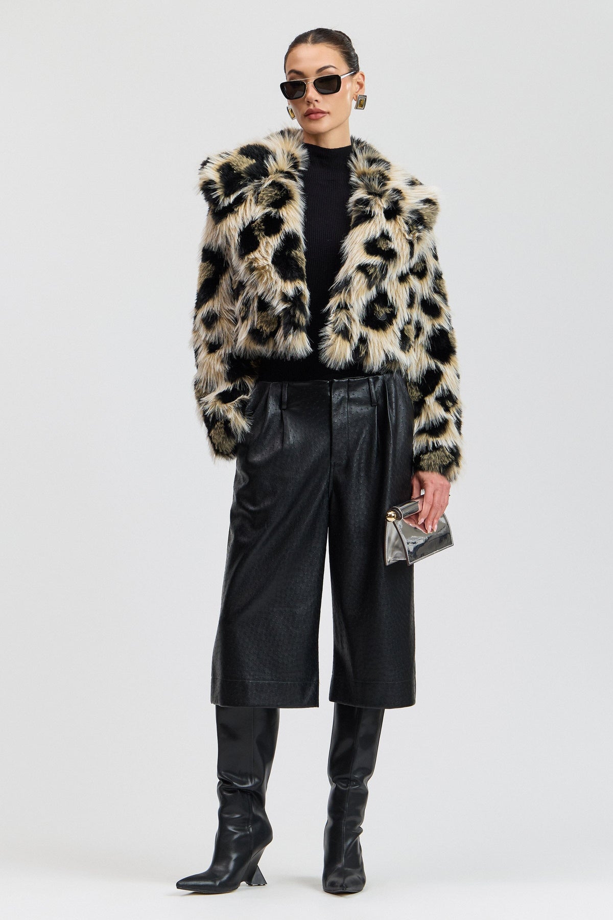 Double-breasted faux fur jacket with a button front. Shop designer women's cute cropped jackets by Avec Les Filles.