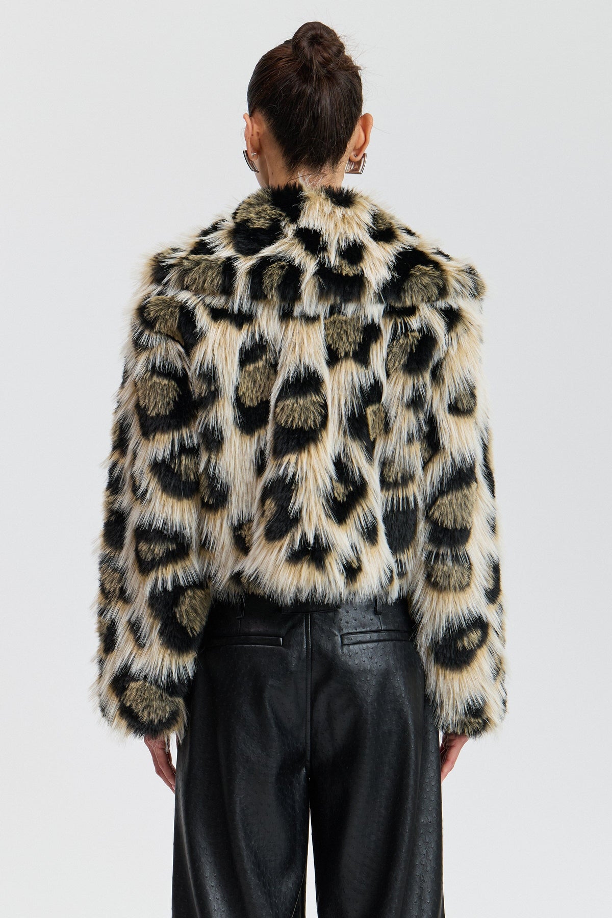 Double-breasted leopard fur jacket with a button front. Shop designer women's cute cropped jackets by Avec Les Filles.