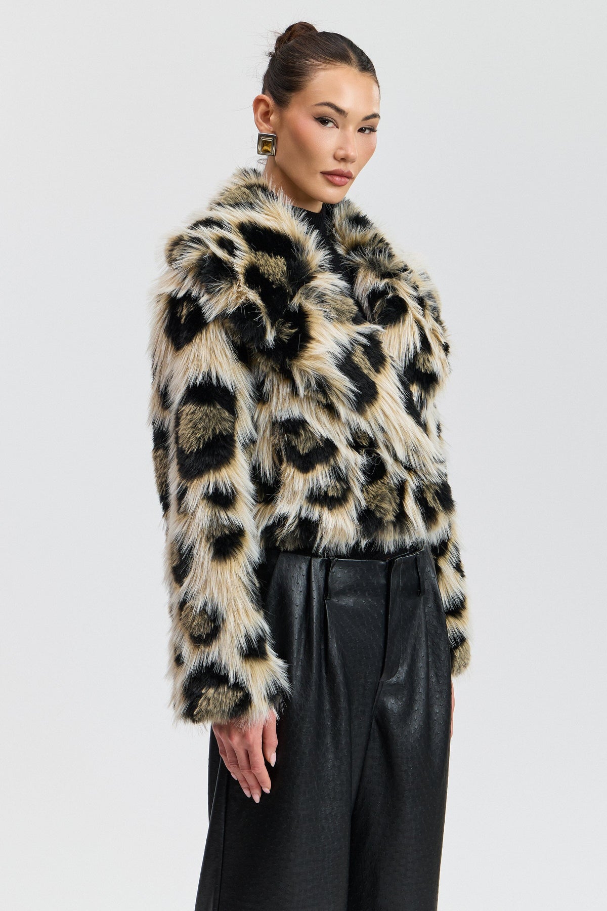Leopard jacket faux fur with a button front. Shop designer women's cute cropped jackets by Avec Les Filles.