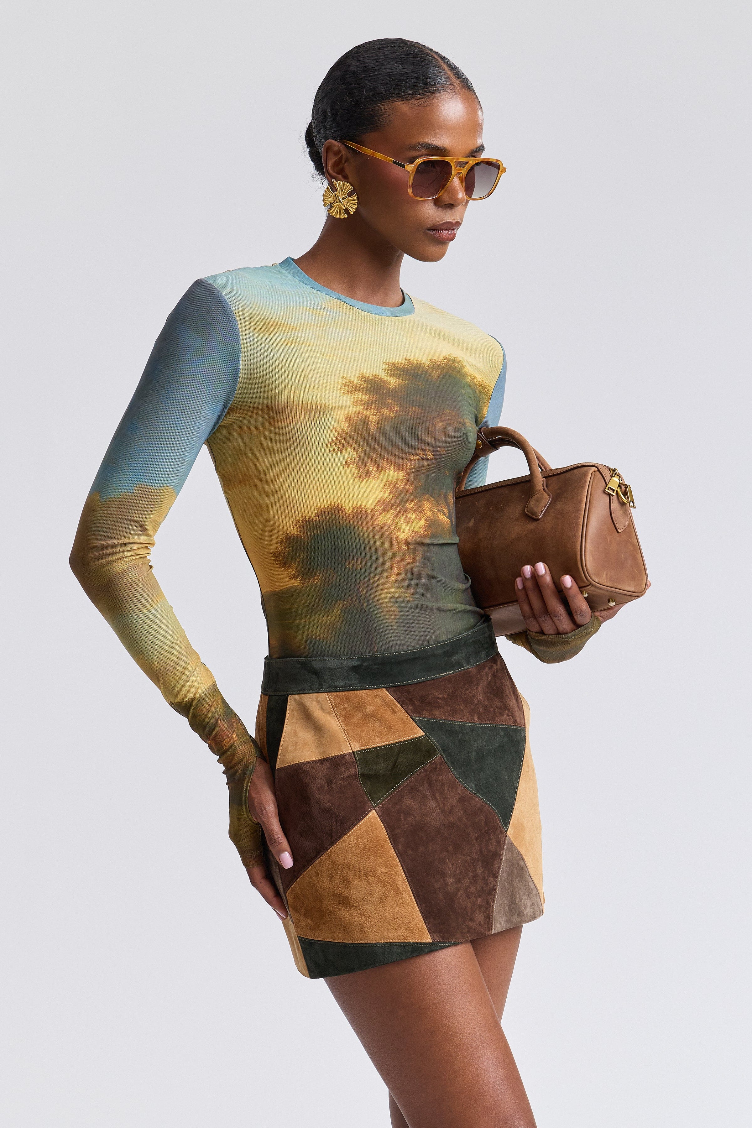 Multicolor mini genuine suede skirt with front pockets and fitted waist - Shop women's mini skirts by Avec Les Filles.