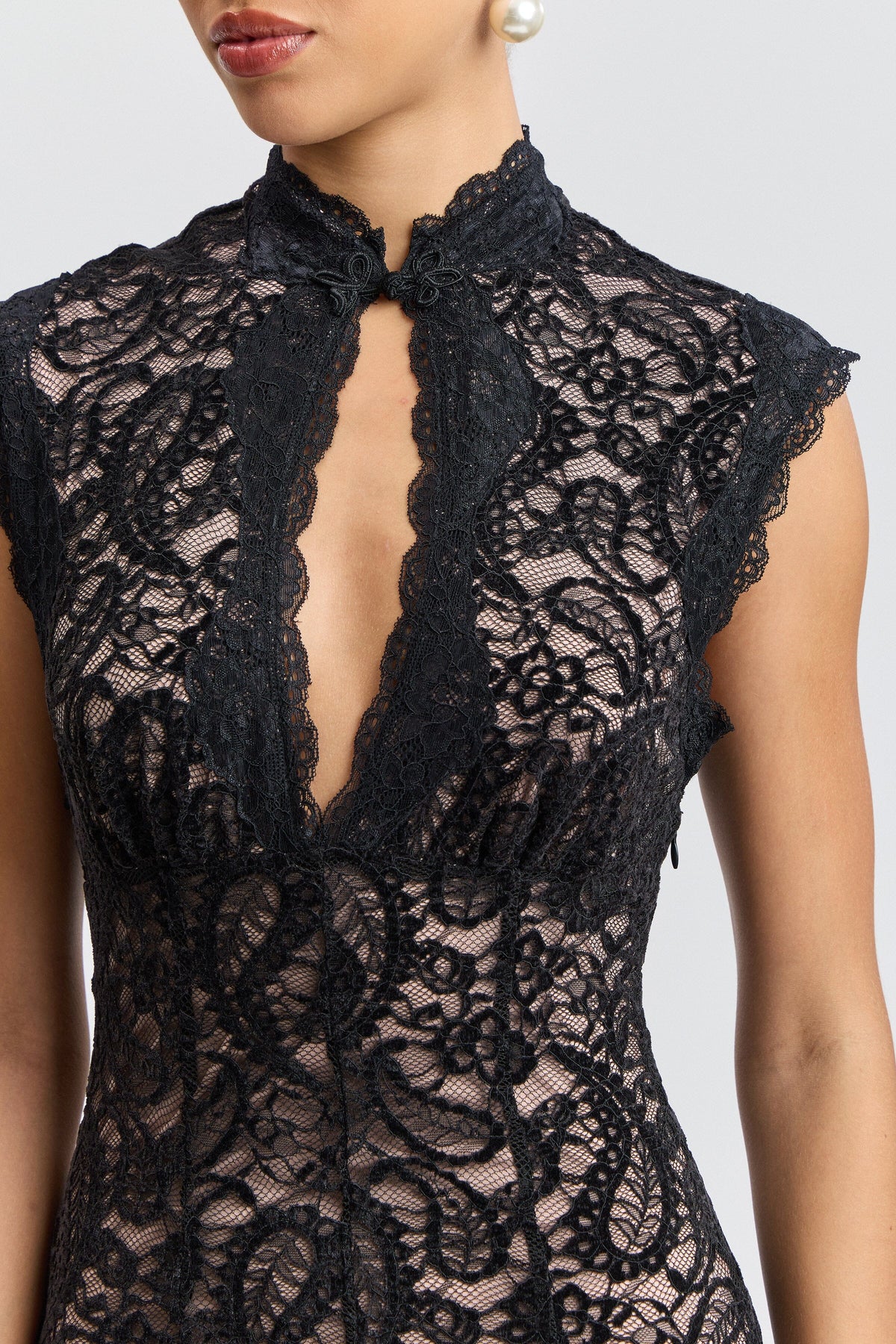 Sleeveless black dress lace long with a keyhole mandarin collar. Shop women's black lace dresses by Avec Les Filles.