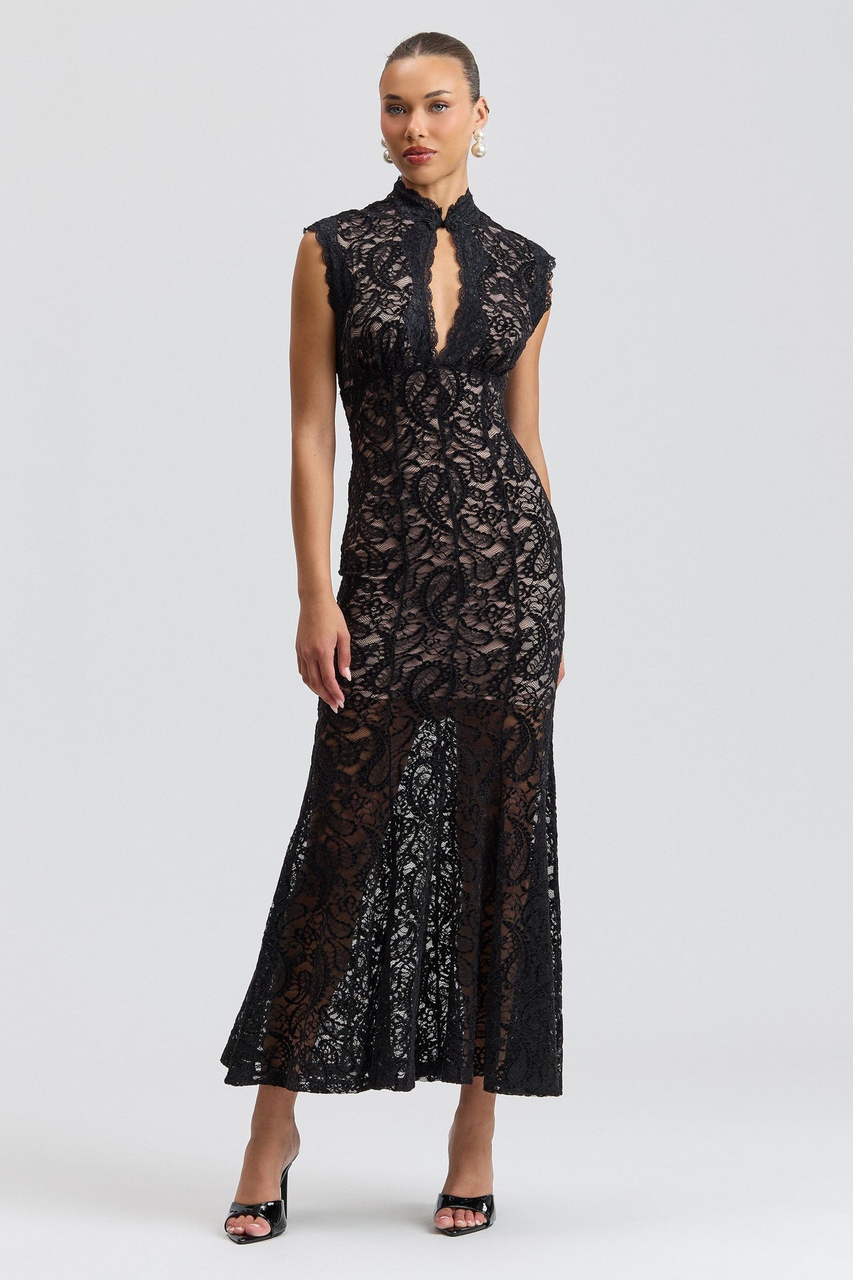 Sleeveless black with lace dress and a fluted skirt. Shop designer women's black lace dresses by Avec Les Filles.