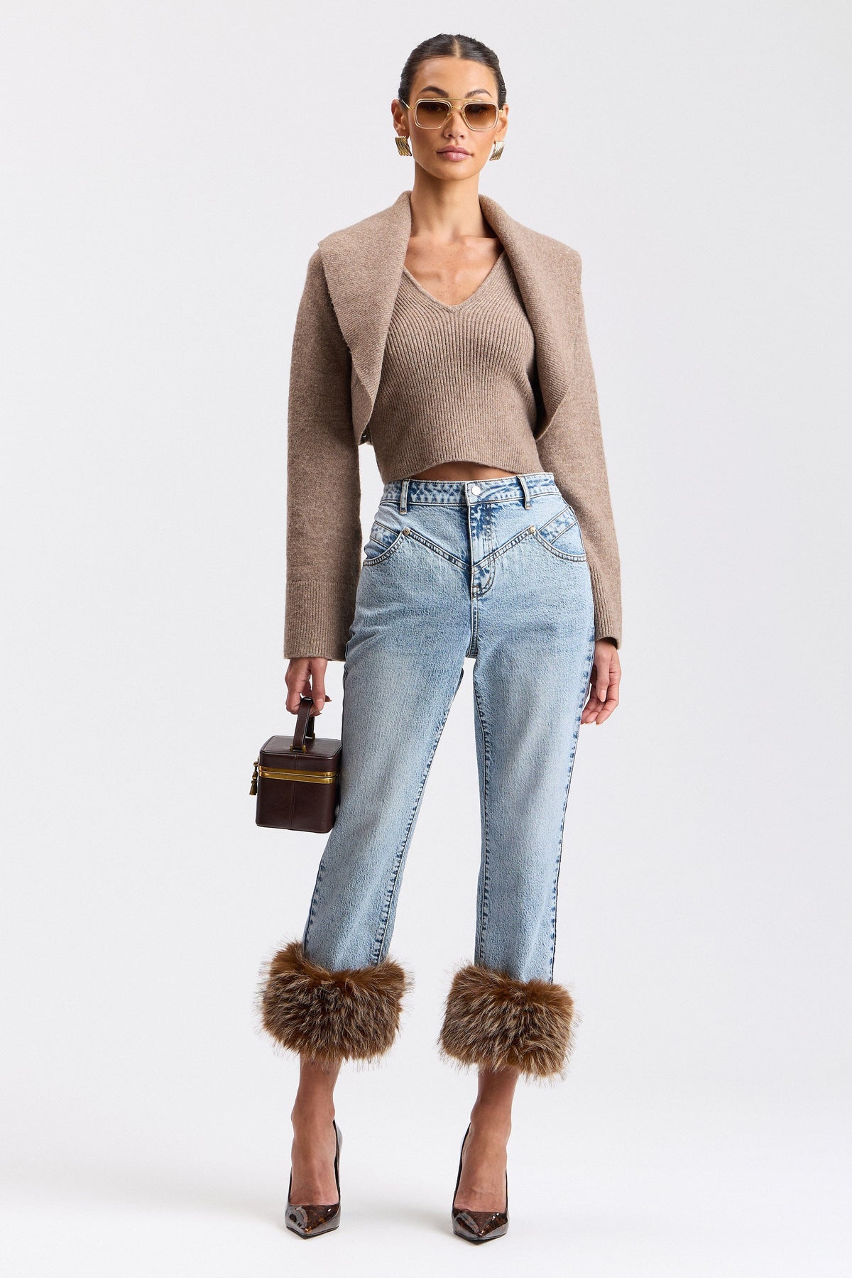 Denim faux-fur cuff stretch straight jeans in a cotton blend with a high rise and pockets by Avec Les Filles.