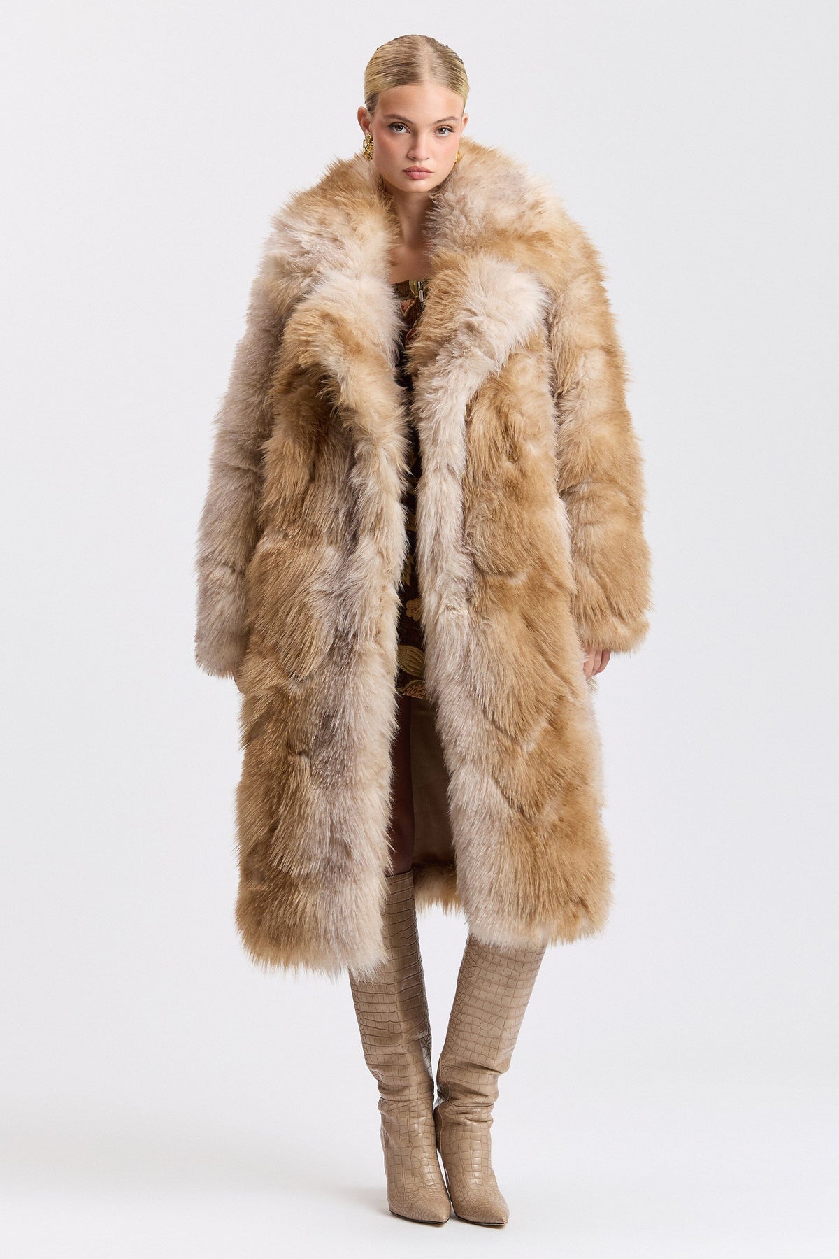 Beige long faux fur coat with wide collar and button front. Shop designer women's cute brown long coats by Avec Les Filles.