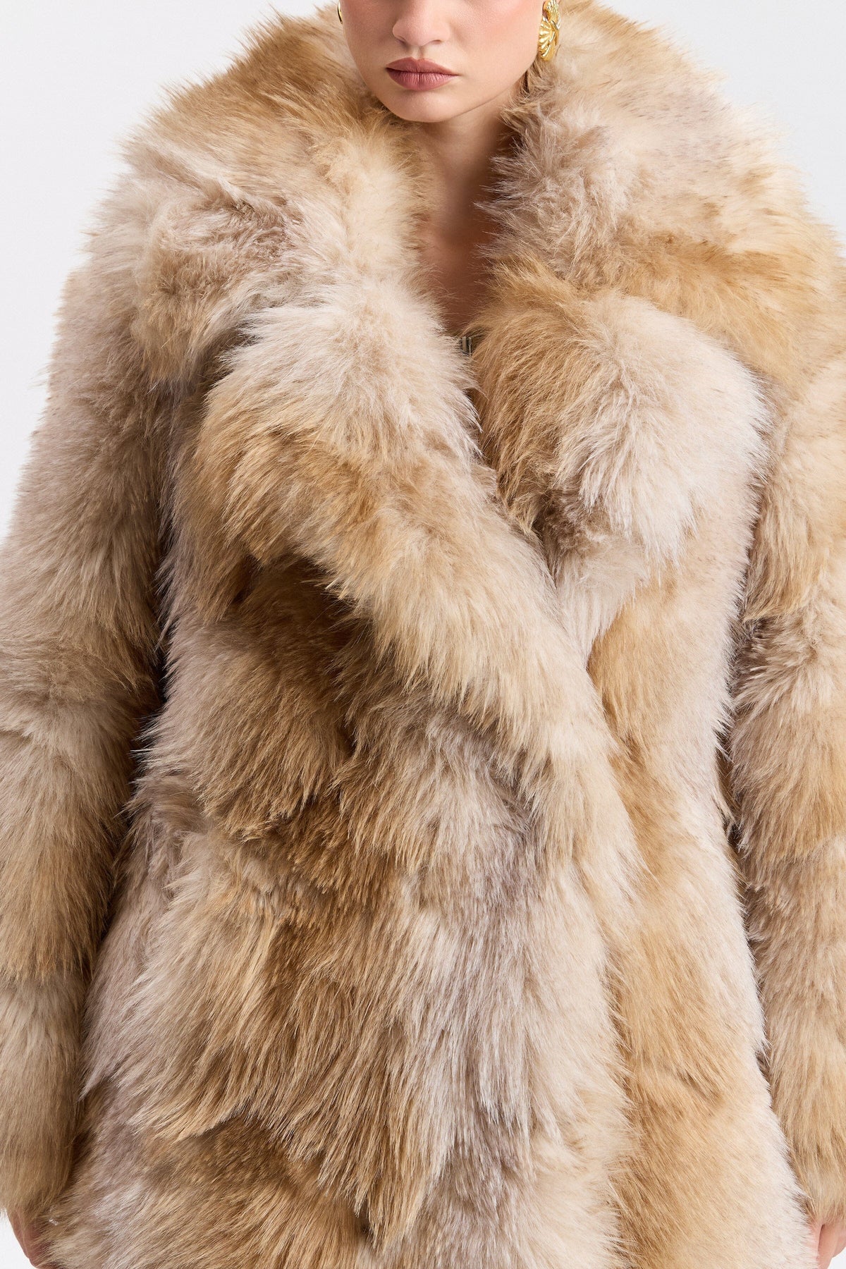Beige faux fur coat long with wide collar and button front. Shop designer women's cute brown long coats by Avec Les Filles.