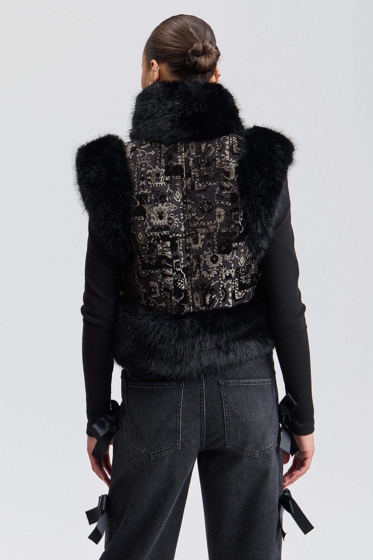 Black faux fur vest for women has a cropped length and an open front - Shop designer vests by Avec Les Filles.