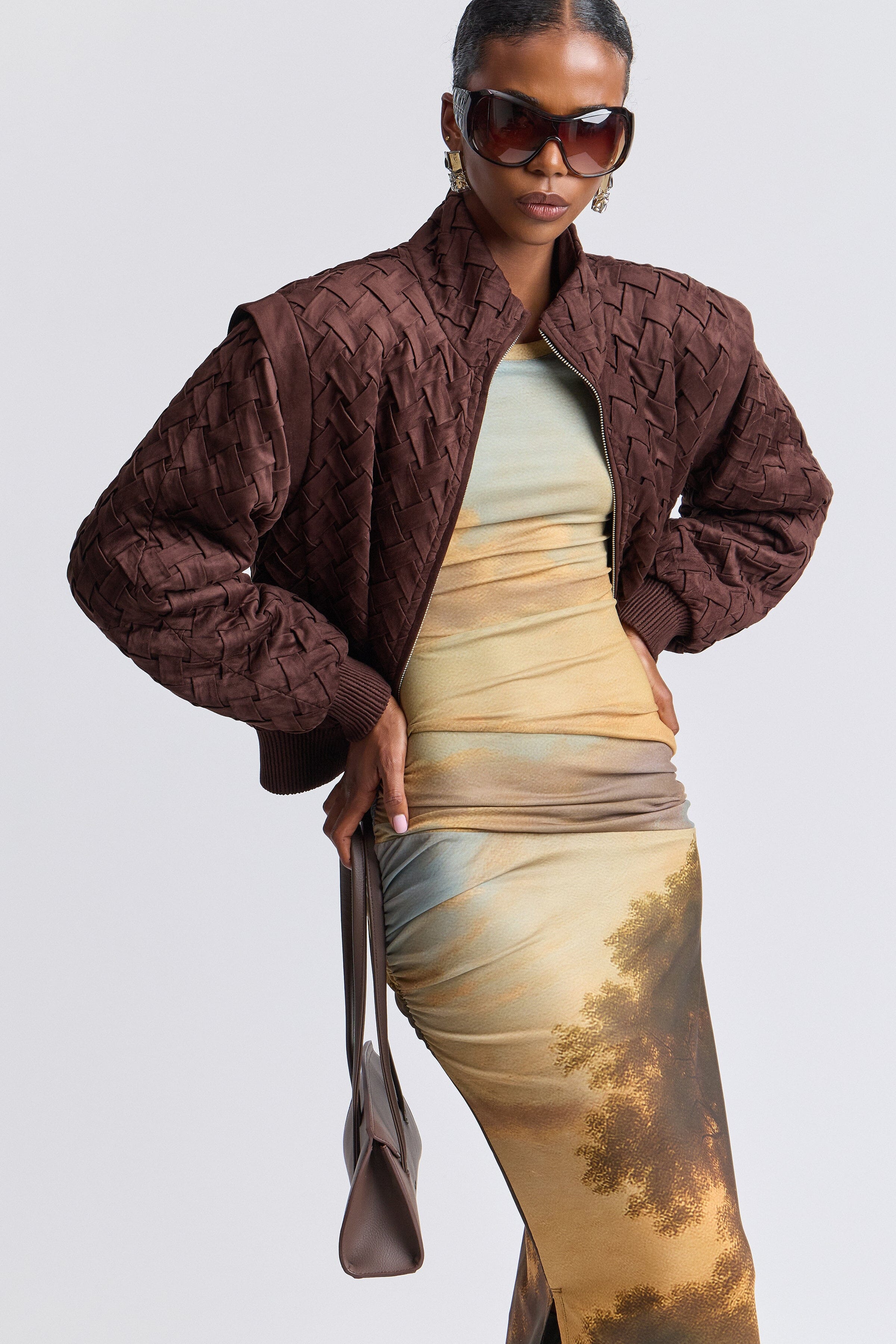 Woven dark brown faux suede bomber jacket with a high stand collar and long sleeves by Avec Les Filles.
