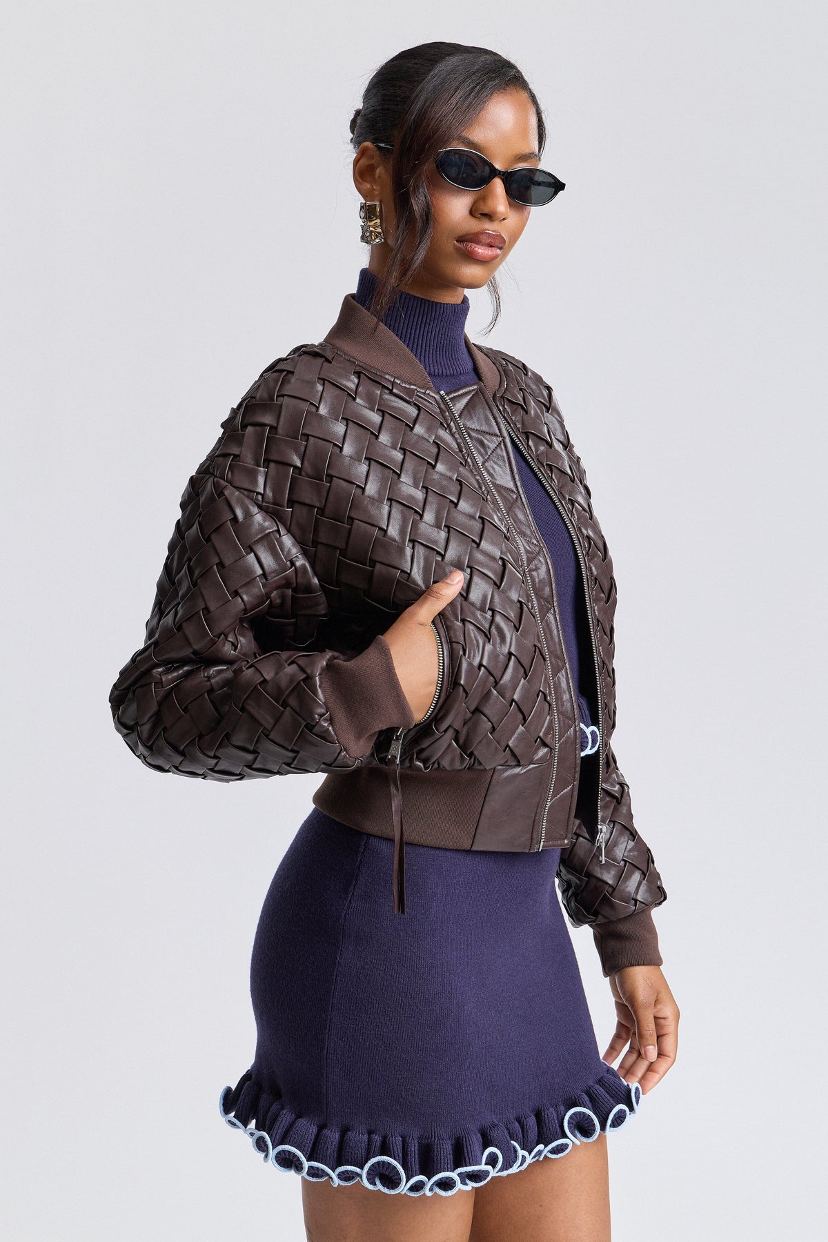 Dark brown bomber jacket with a zip front and long sleeves - Shop designer women's jackets by Avec Les Filles.