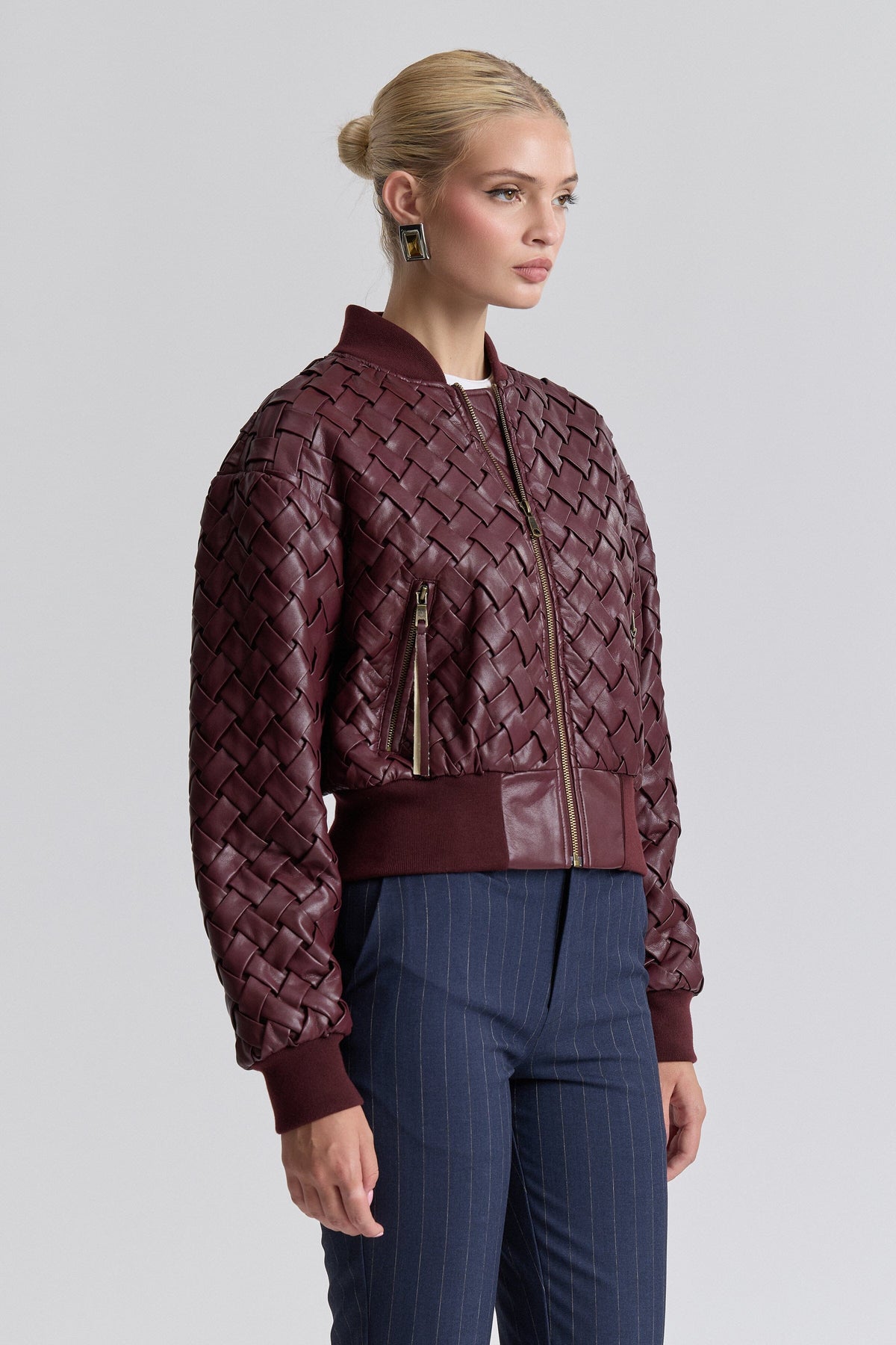 Red faux leather bomber jacket women with a zip front and ribbed collar. Shop bomber jackets by Avec Les Filles.