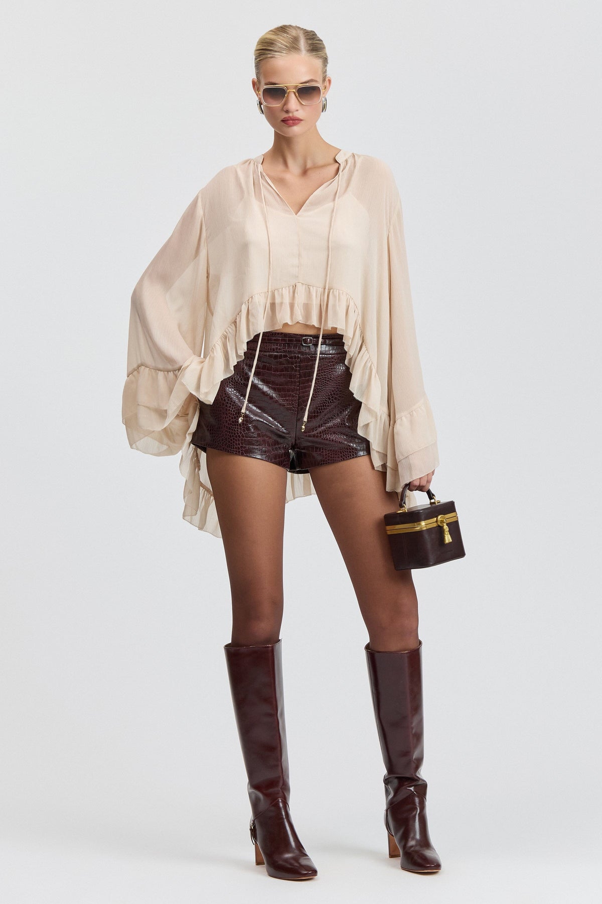 Croc-embossed belted leather micro shorts with high-rise waist. Shop designer leather micro shorts by Avec Les Filles.