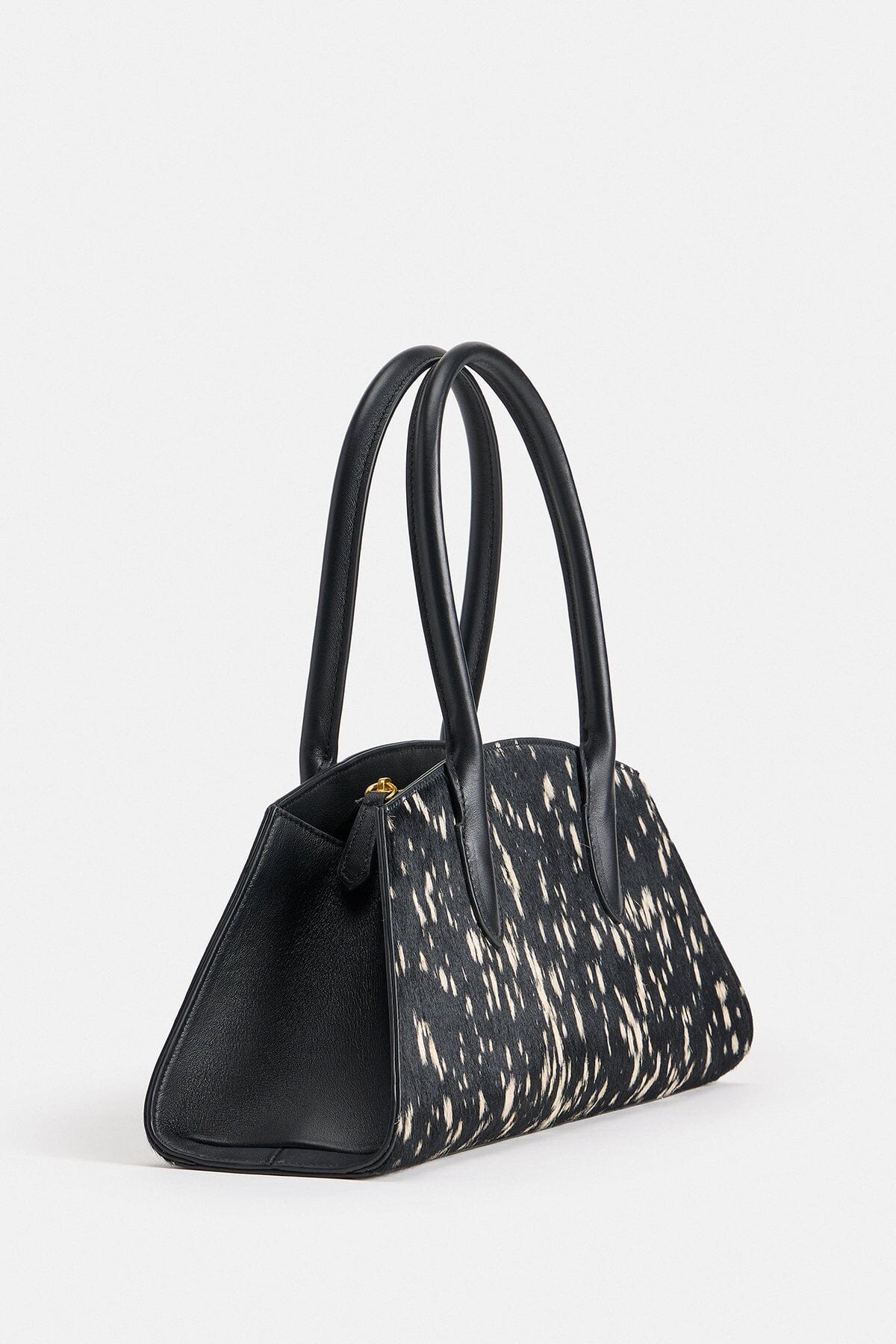 Black and white bag with dual leather top handles - Shop women's cute pony hair bags by Avec Les Filles.