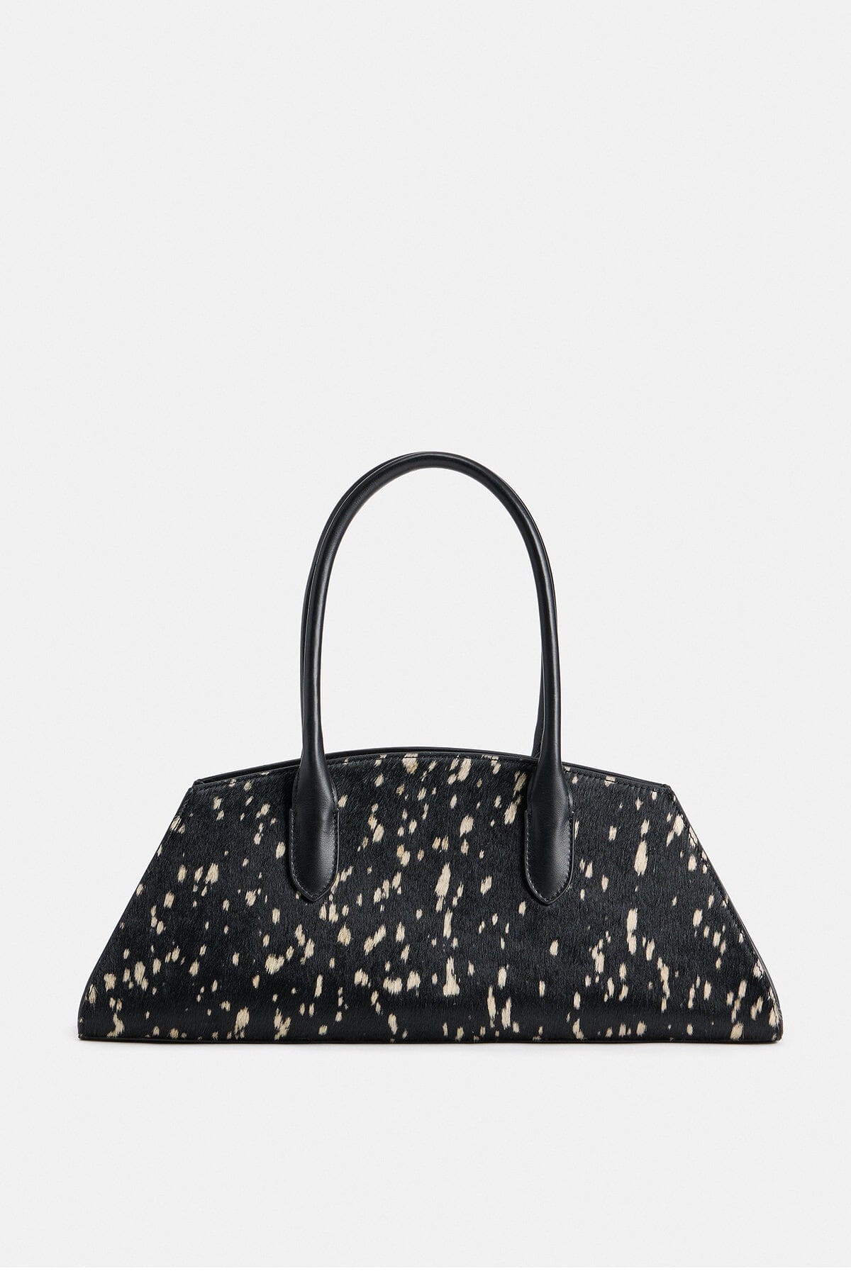 Black and white purse is crafted from 100% genuine leather - Shop women's cute pony hair bags by Avec Les Filles.