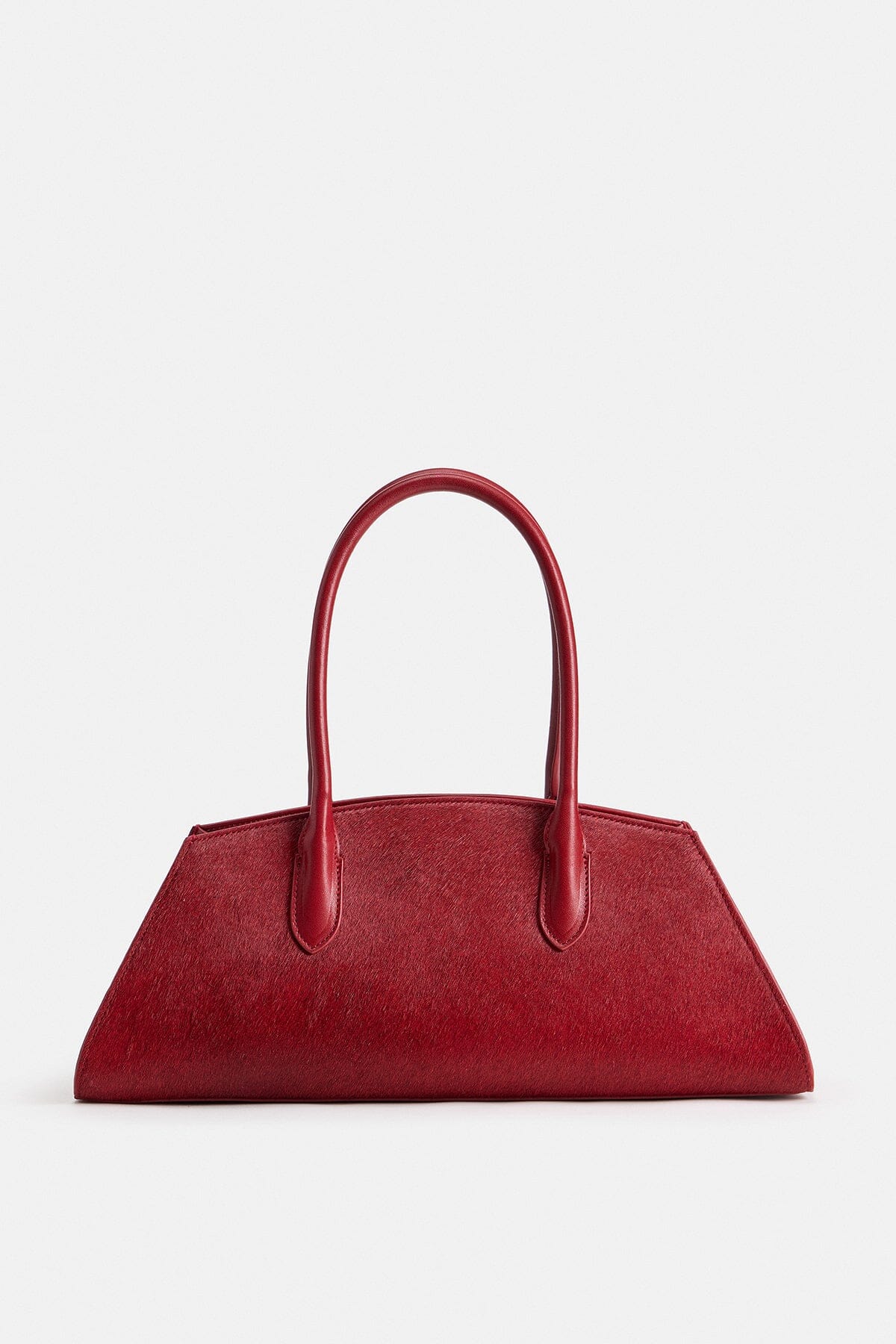 Red bag is crafted from genuine leather with dual top handles - Shop women's handbags by Avec Les Filles.