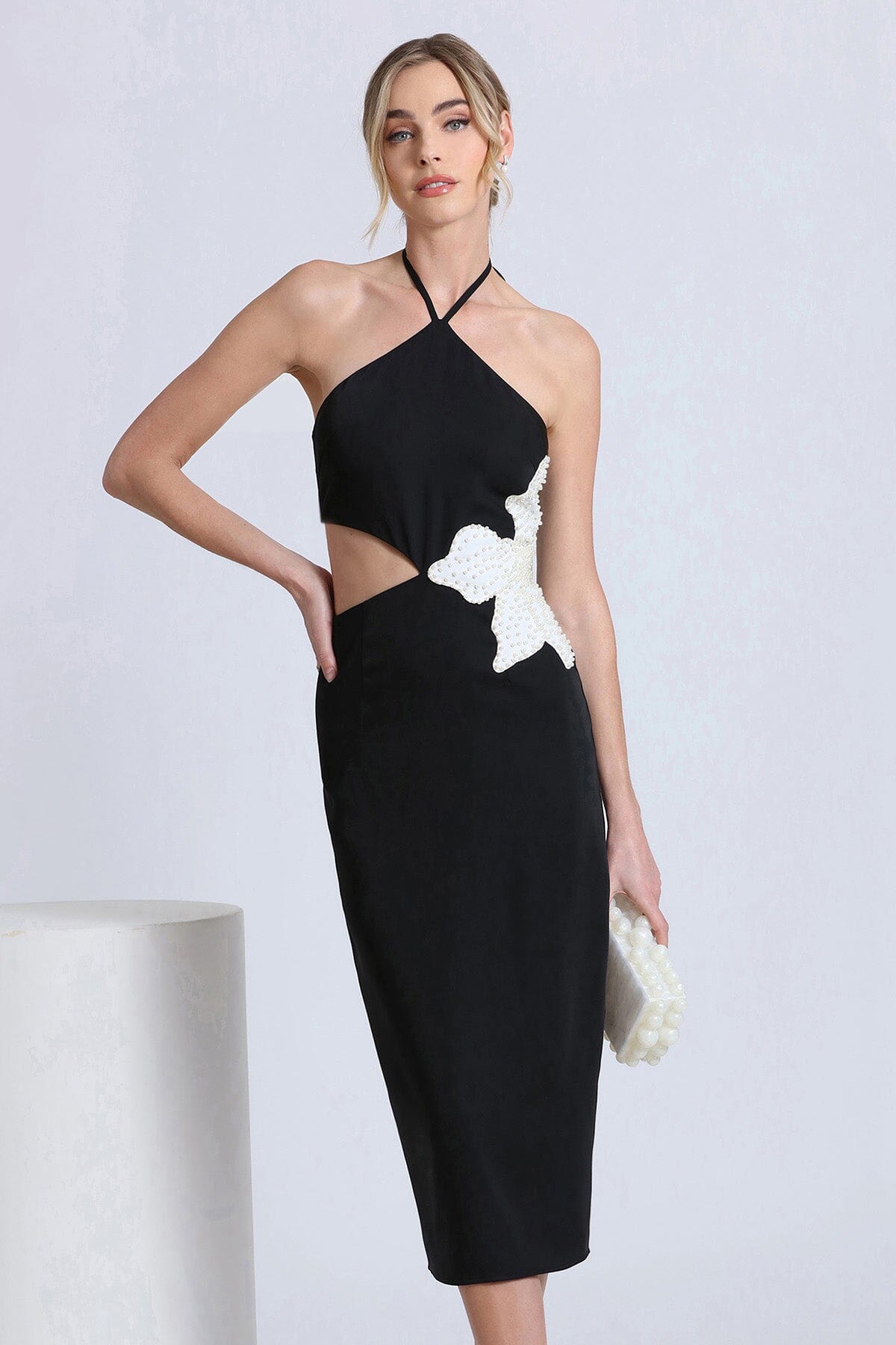 white flower embellished cut-out black halter dress - women's figure flattering sexy date night dresses for 2024 fashion trends by Avec Les Filles