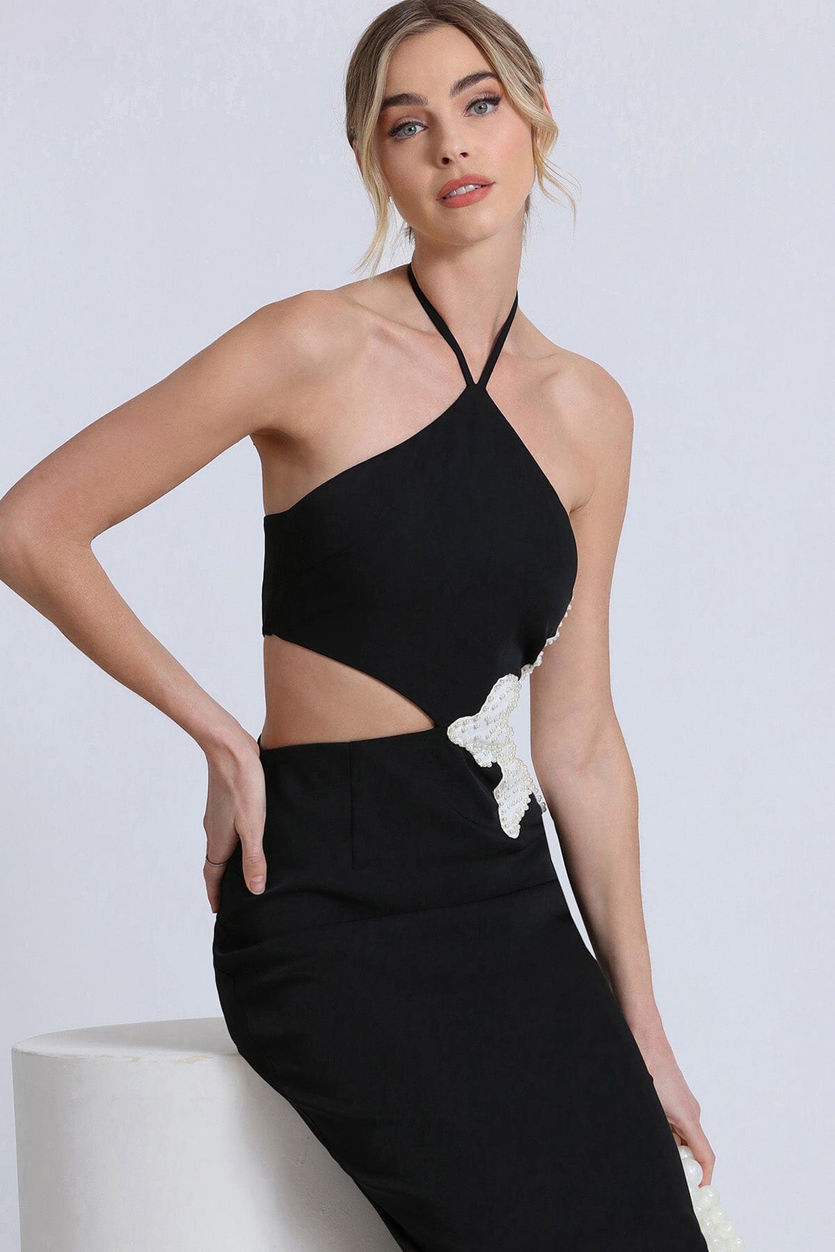 White flower embellished cut-out black halter dress - figure flattering elegant fashion dresses for women's Summer 2024 trends by Avec Les Filles