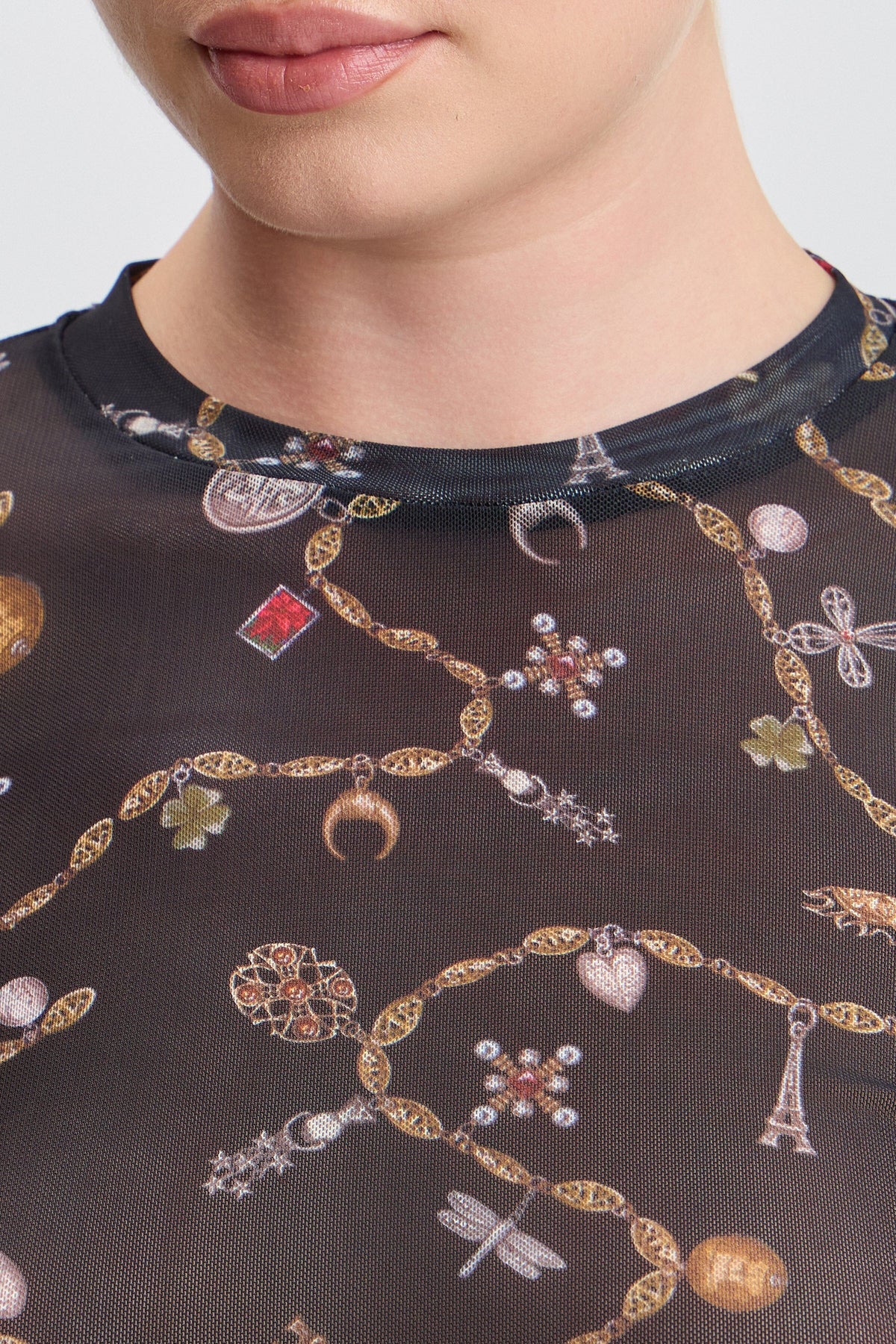 Printed black mesh long sleeve top with a round neckline - Shop designer women's cute black tops by Avec Les Filles.