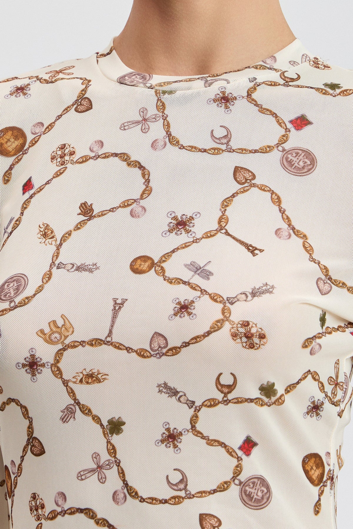 Cream printed mesh long sleeve top with a round neck - Shop designer women's cute floral mesh tops by Avec Les Filles.