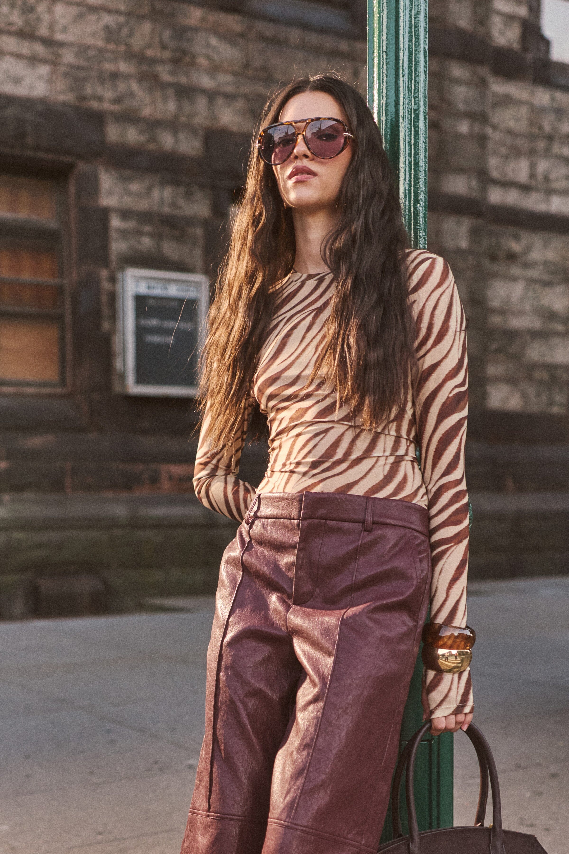 animal print mesh zebra print top with crew neck and thumbhole sleeves. Shop women's printed tops by Avec Les Filles