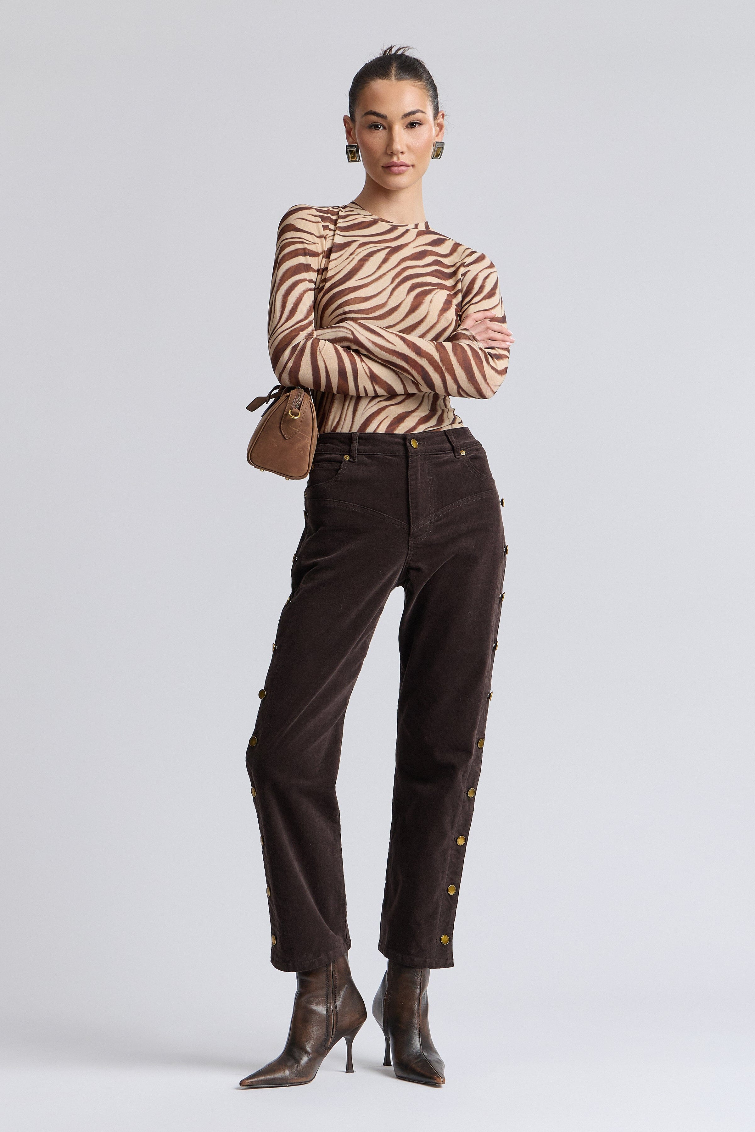 Zebra animal print mesh long sleeve top with crew neck and thumbhole sleeves. Shop cute printed tops by Avec Les Filles